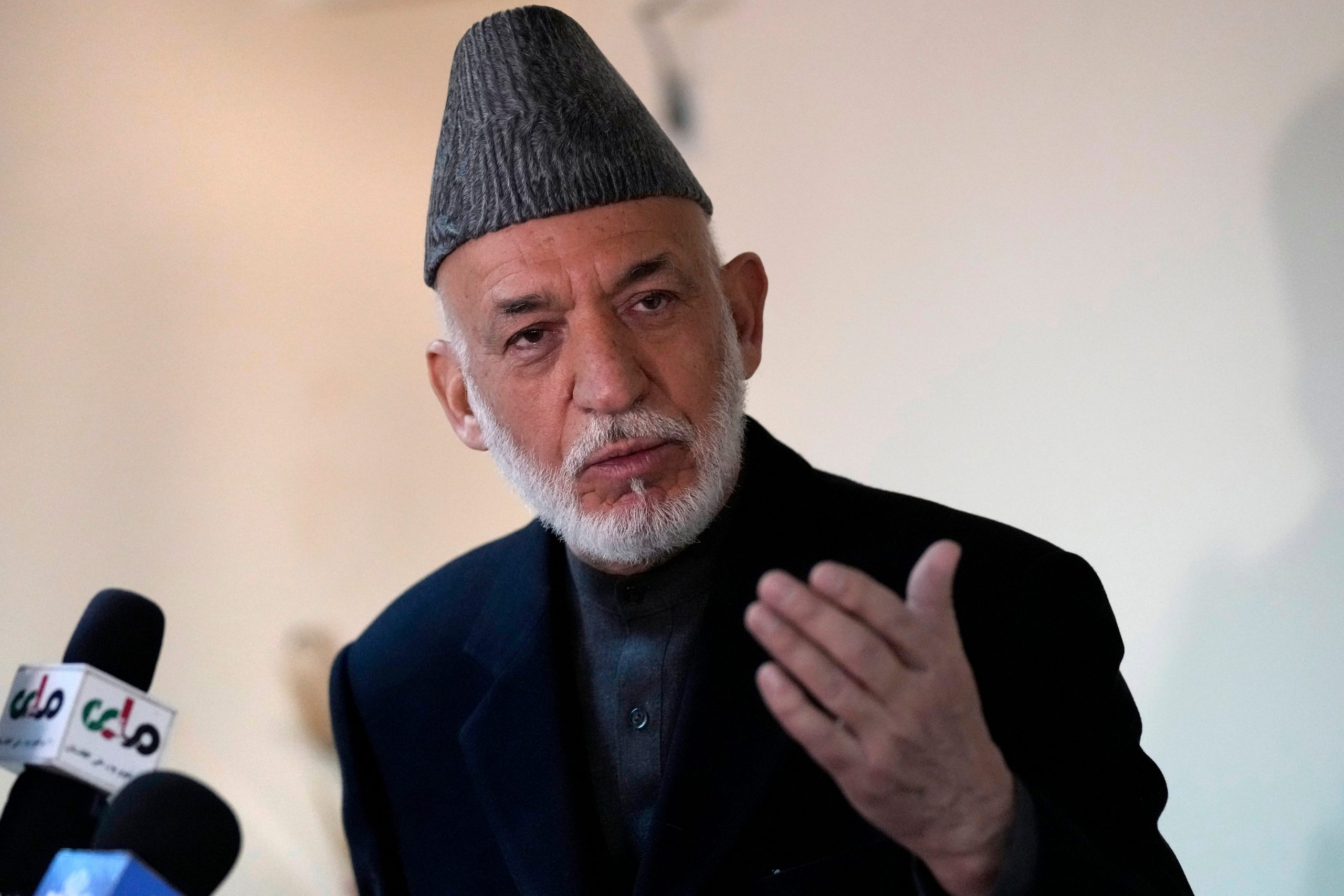 Former Afghan President Hamid Karzai speaks at a press conference in Kabul