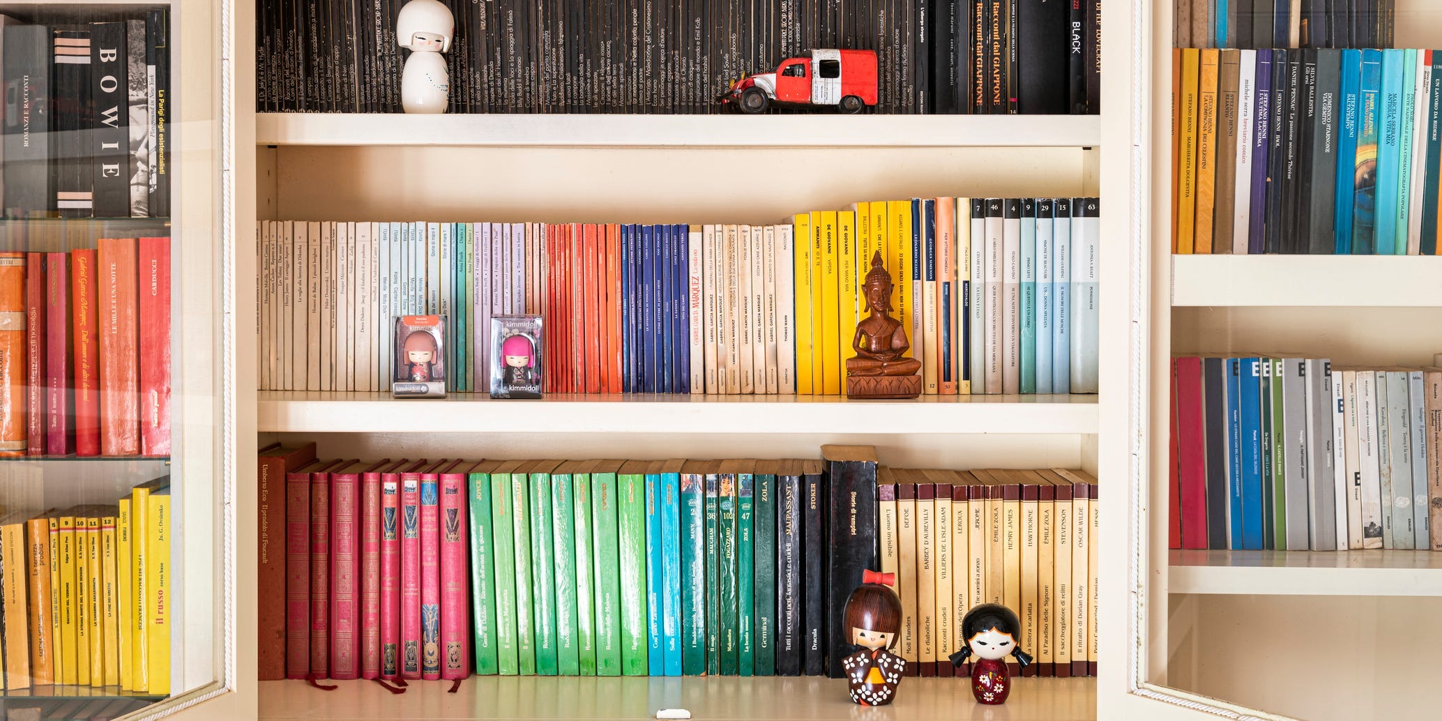 Organized bookshelf by color