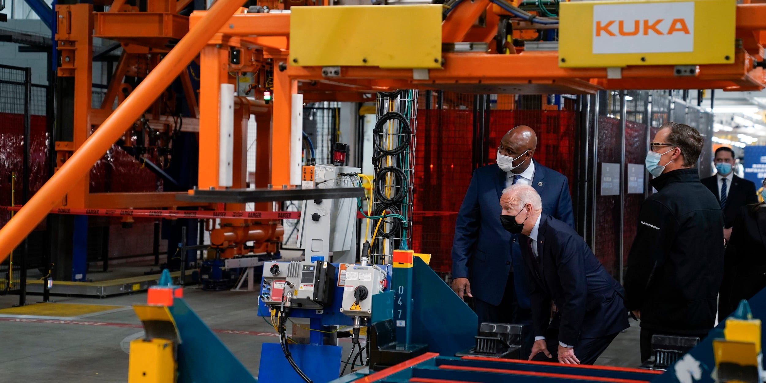 Joe Biden tours a Michigan factory