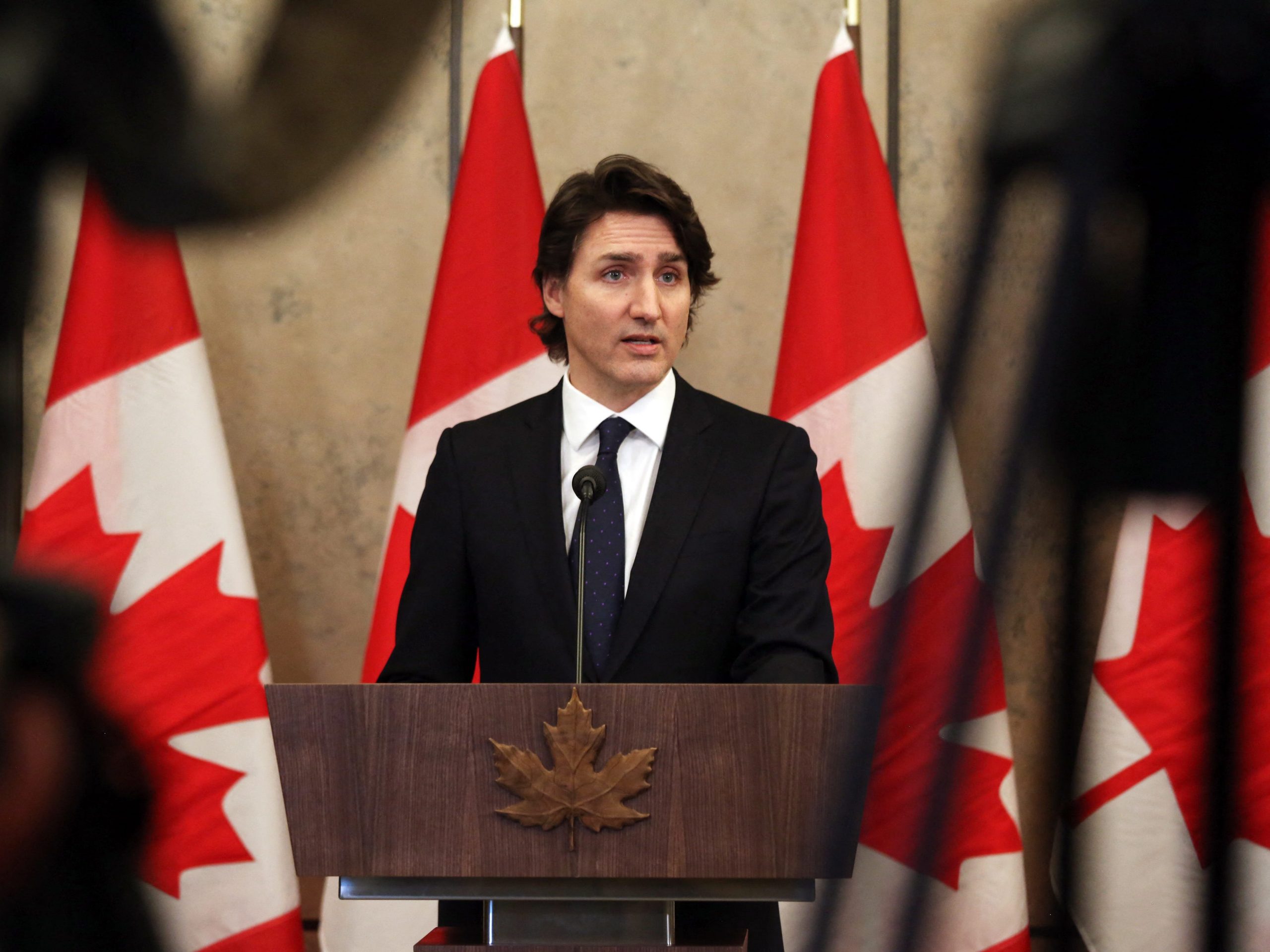 Canada's Prime Minister Justin Trudeau speaks with reporters during a news conference on Parliament Hill February 11, 2022 in Ottawa, Canada.