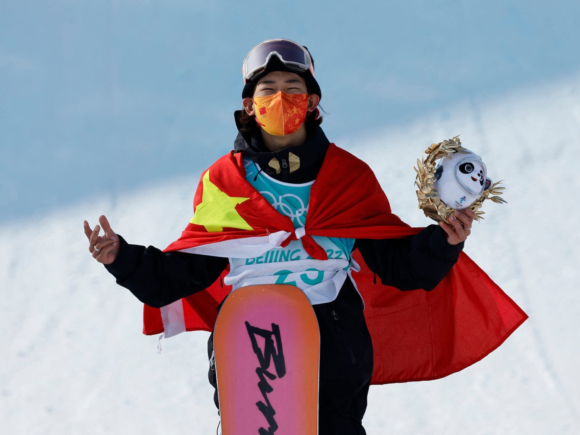 Gold medallist Su Yiming of China reacts on the podium