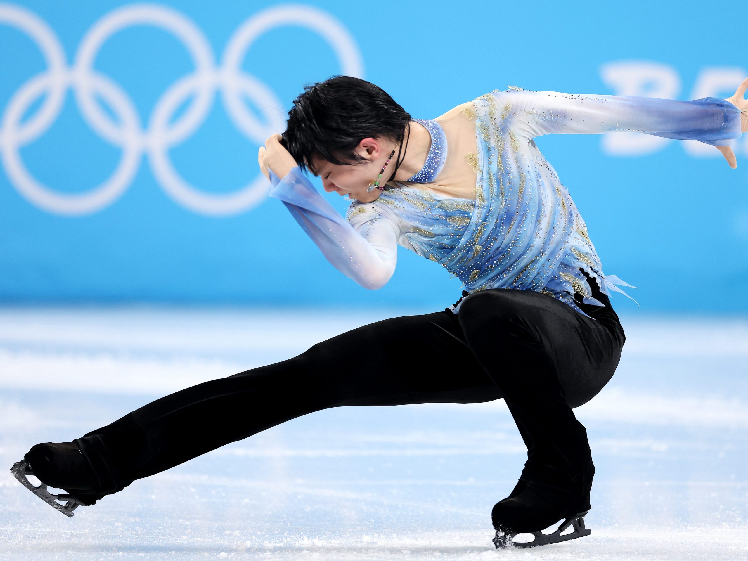 Yuzuru Hanyu competes in the men's singles figure skating in Beijing.