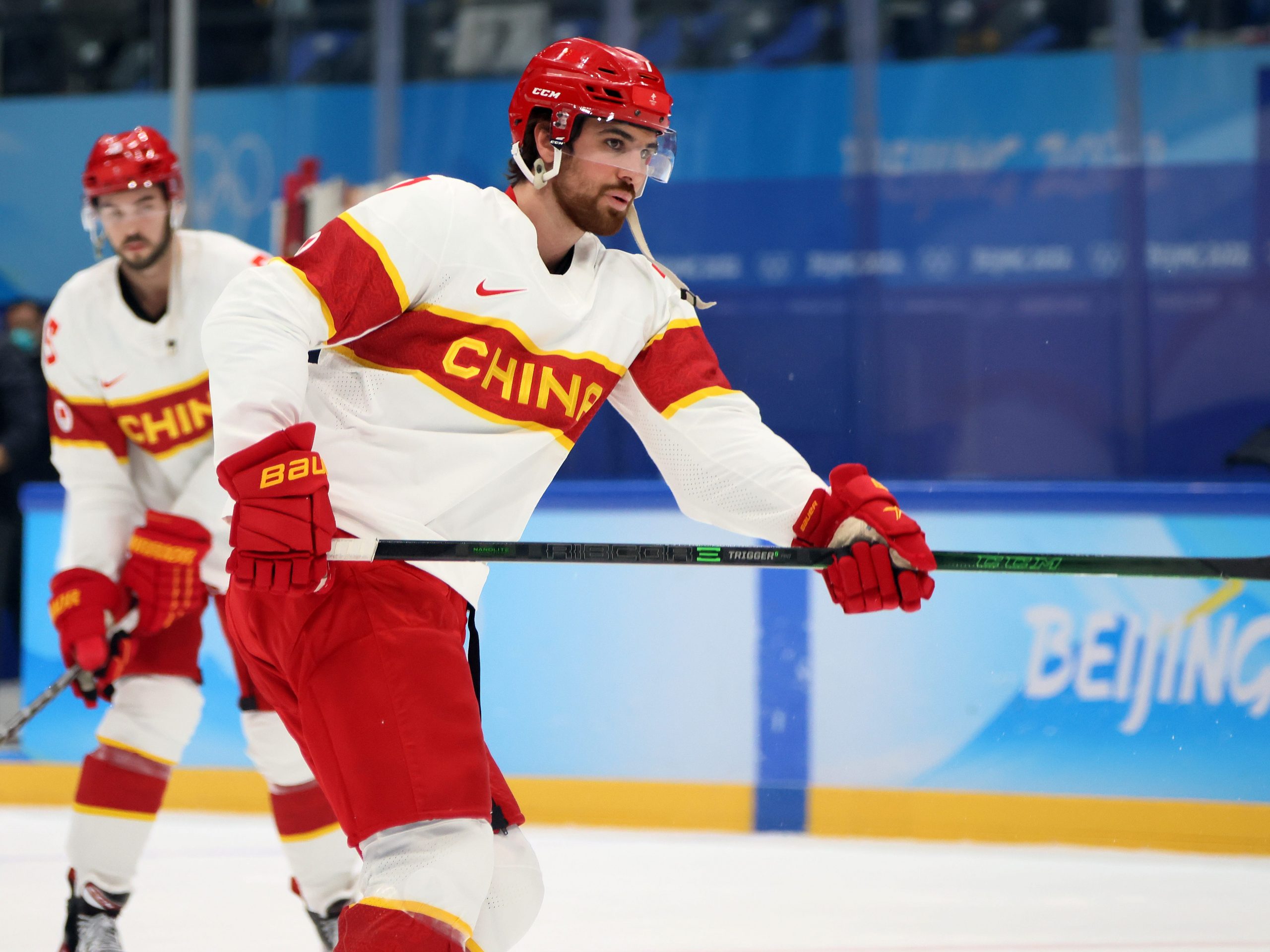 Kailiaosi Jieke #7 of Team China warms up before the game against Team United States during the Men's Ice Hockey Preliminary Round Group A match on Day 6 of the Beijing 2022 Winter Olympic Games at National Indoor Stadium on February 10, 2022 in Beijing, China.