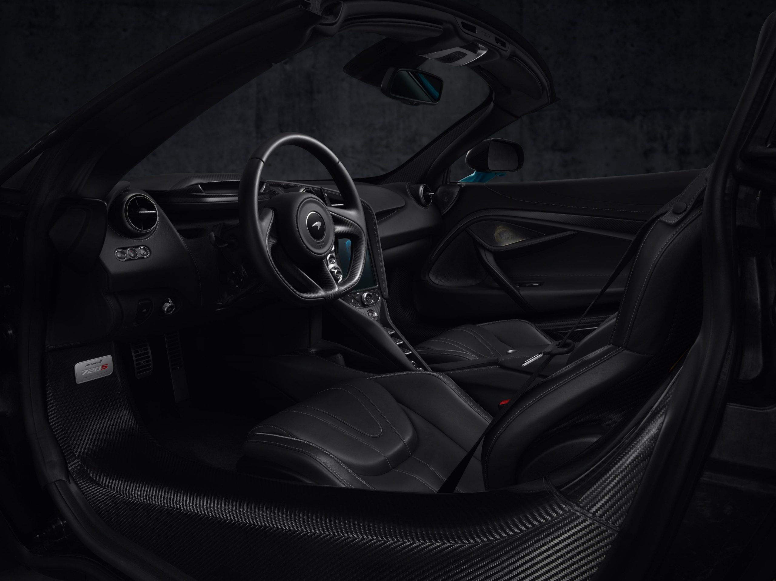 The black interior of a McLaren 720S.