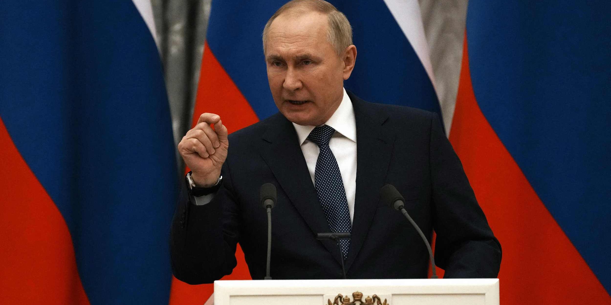 Russian President Vladimir Putin gestures during a joint press conference with French President after their meeting in Moscow, on February 7, 2022. - International efforts to defuse the standoff over Ukraine intensified with French President holding talks in Moscow and German Chancellor in Washington to coordinate policies as fears of a Russian invasion mount. (Photo by Thibault Camus / POOL / AFP) (Photo by THIBAULT CAMUS/POOL/AFP via Getty Images)