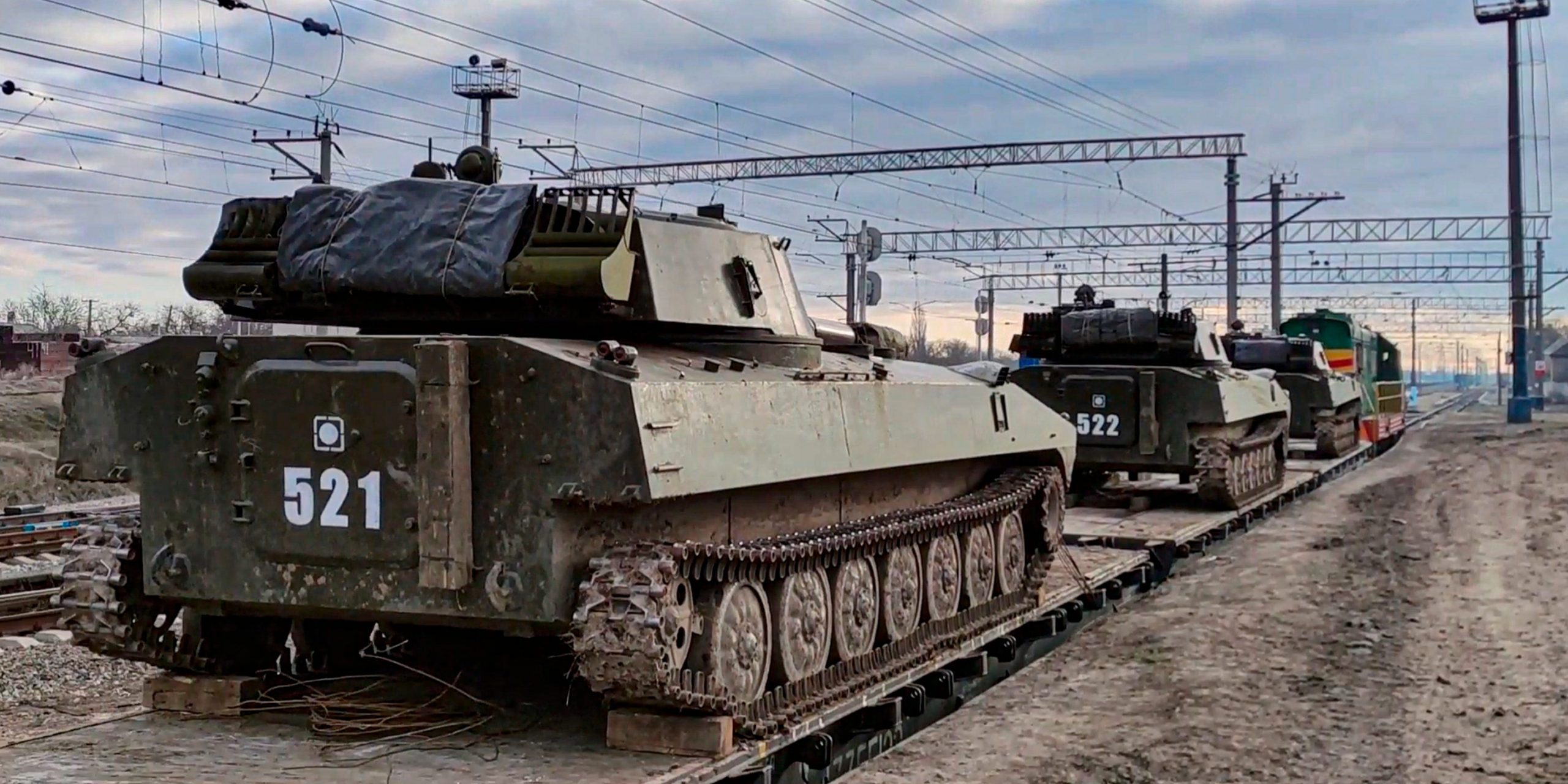 Russian tanks move along a railway in South Russia near Ukraine