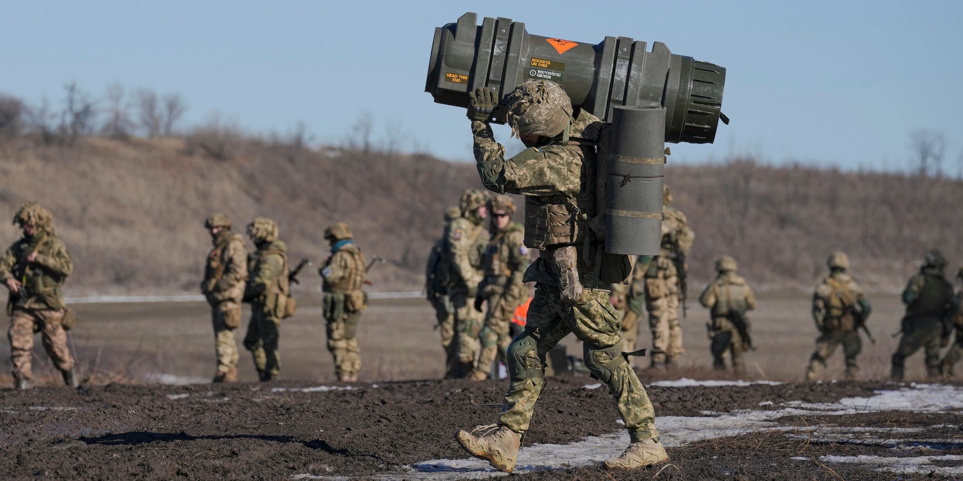 A Ukrainian serviceman carries an anti-tank weapon during an exercise in the Joint Forces Operation in eastern Ukraine on February 15, 2022, amid fears of a Russian invasion.