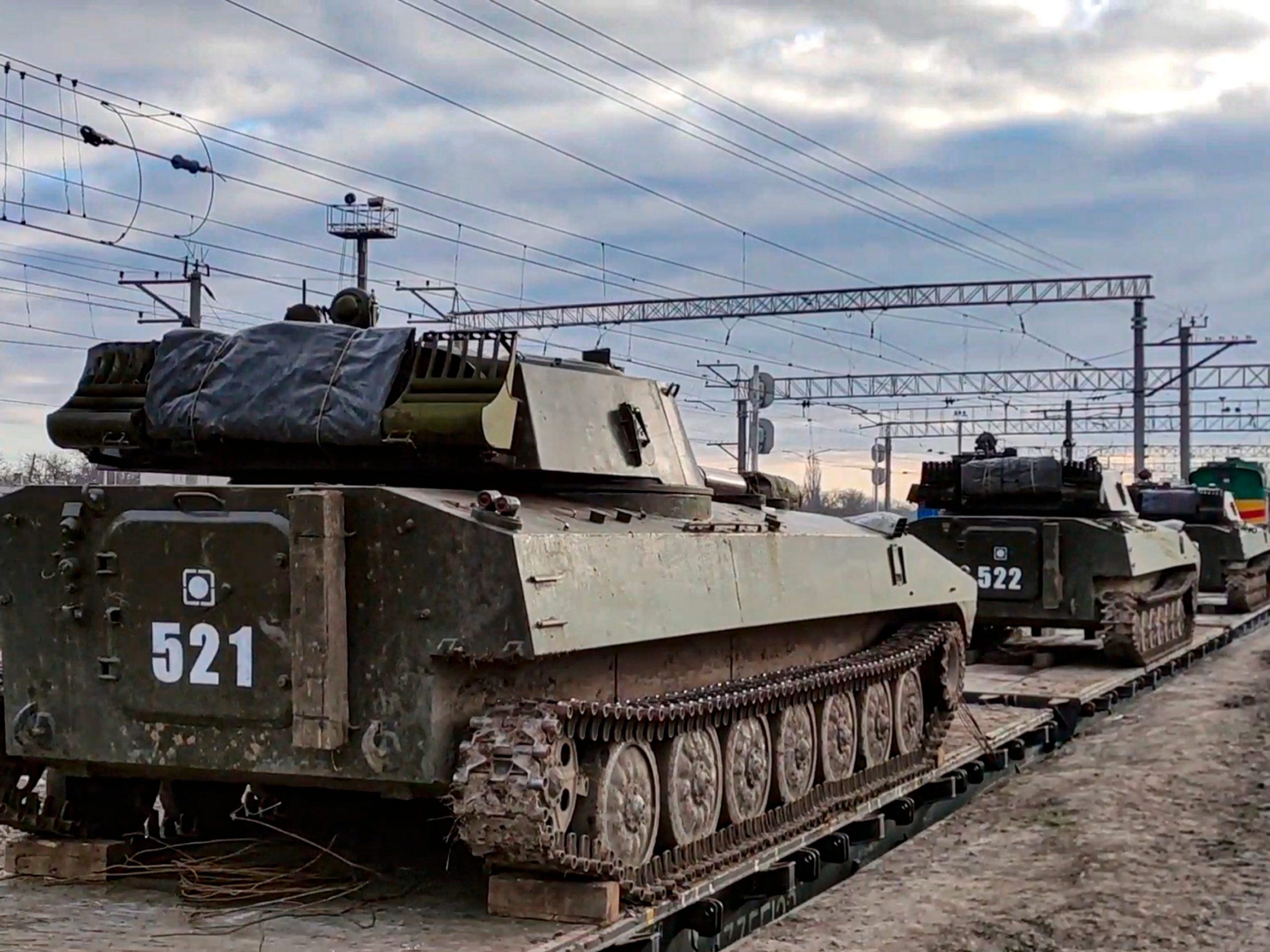 Russian tanks move along a railway in South Russia near Ukraine