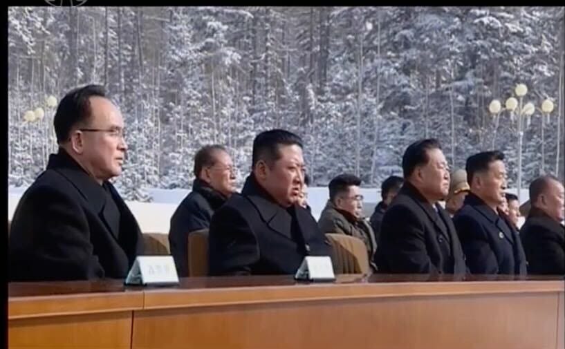 Kim Jong Un and other North Korean officials at an event celebrating Kim Jong Il.