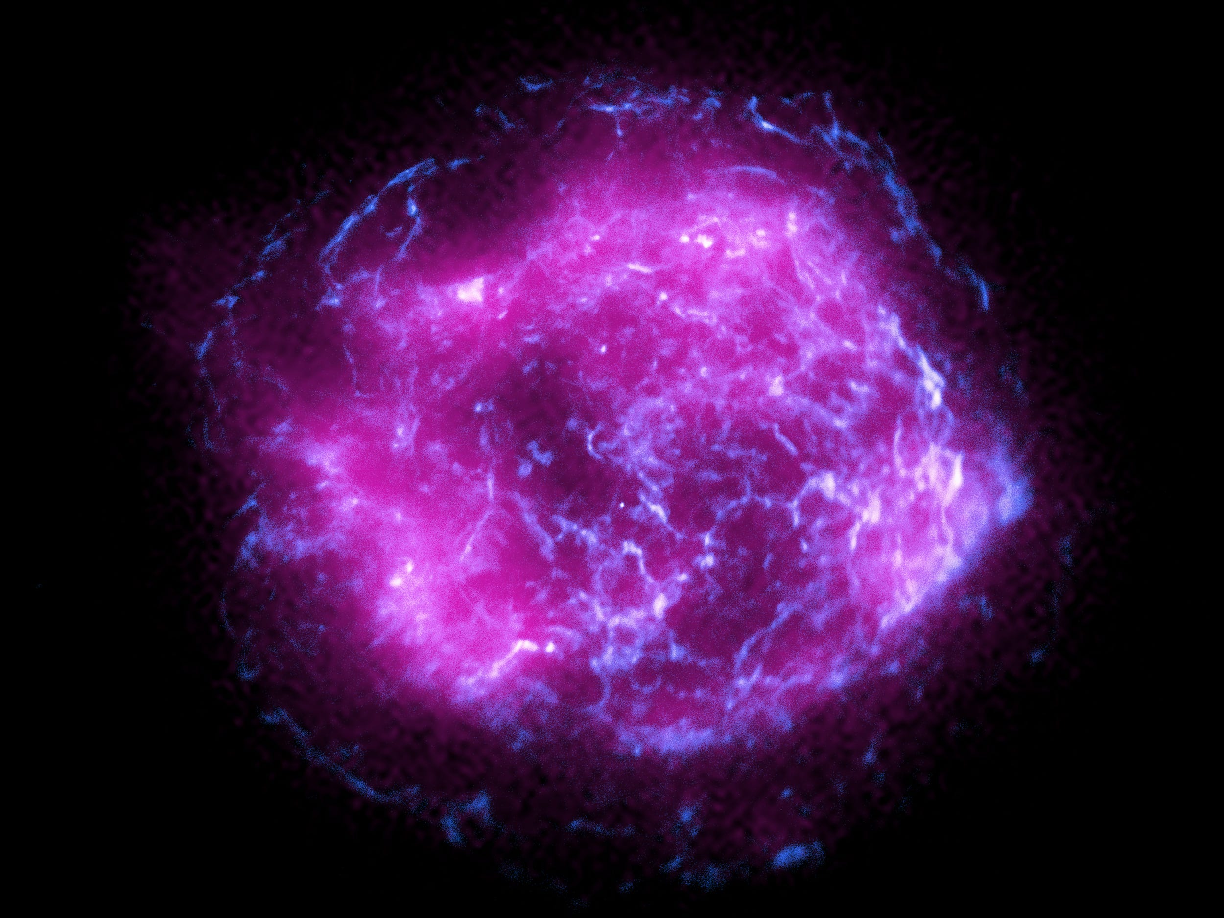supernova remnant purple blue gas clouds in a round formation in space