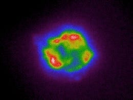 supernova image from x ray telescope round formation of gases blue green red