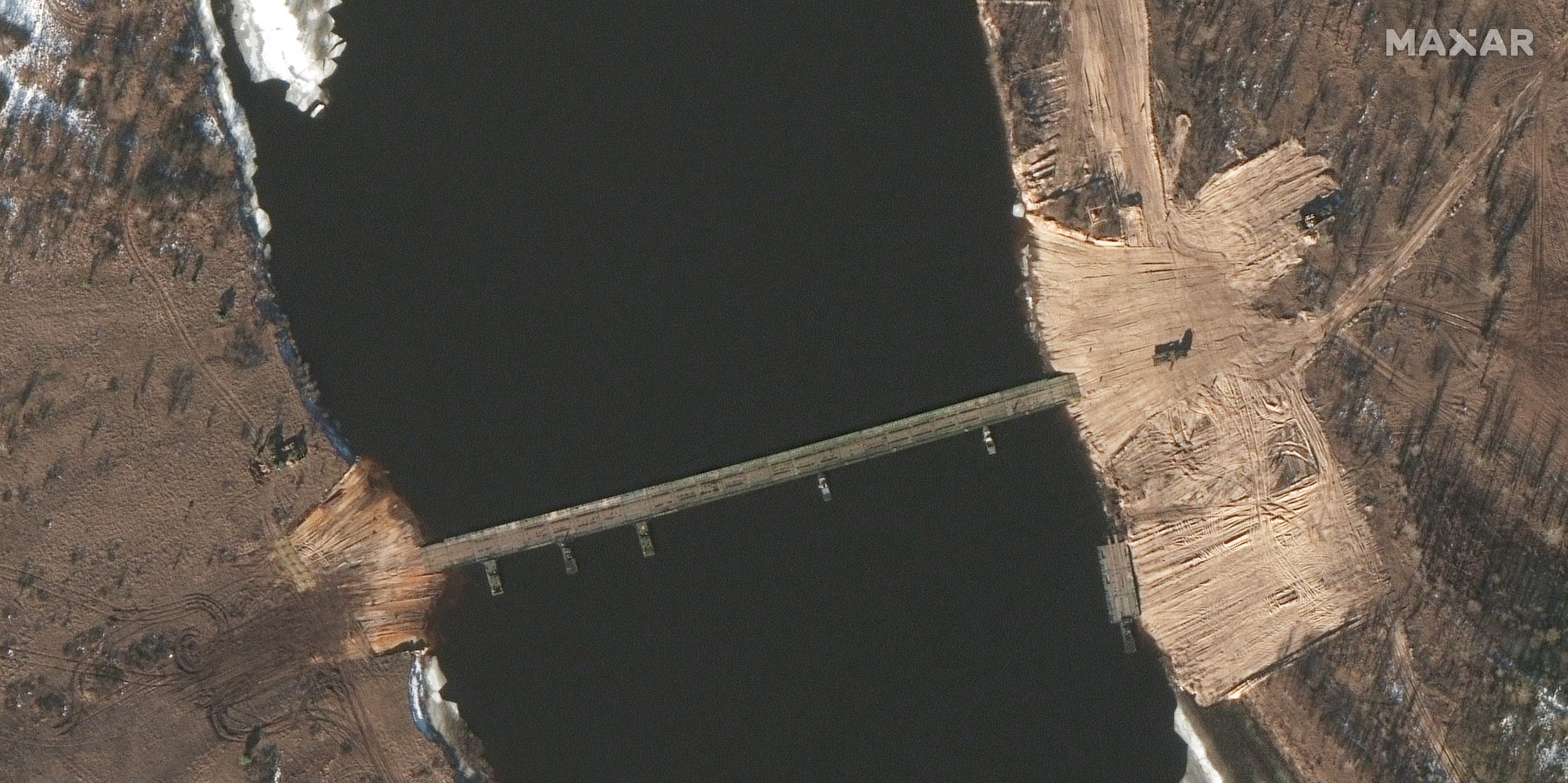 A new military pontoon bridge has been established over the Pripyat River, less than four miles from the Belarus-Ukraine border.