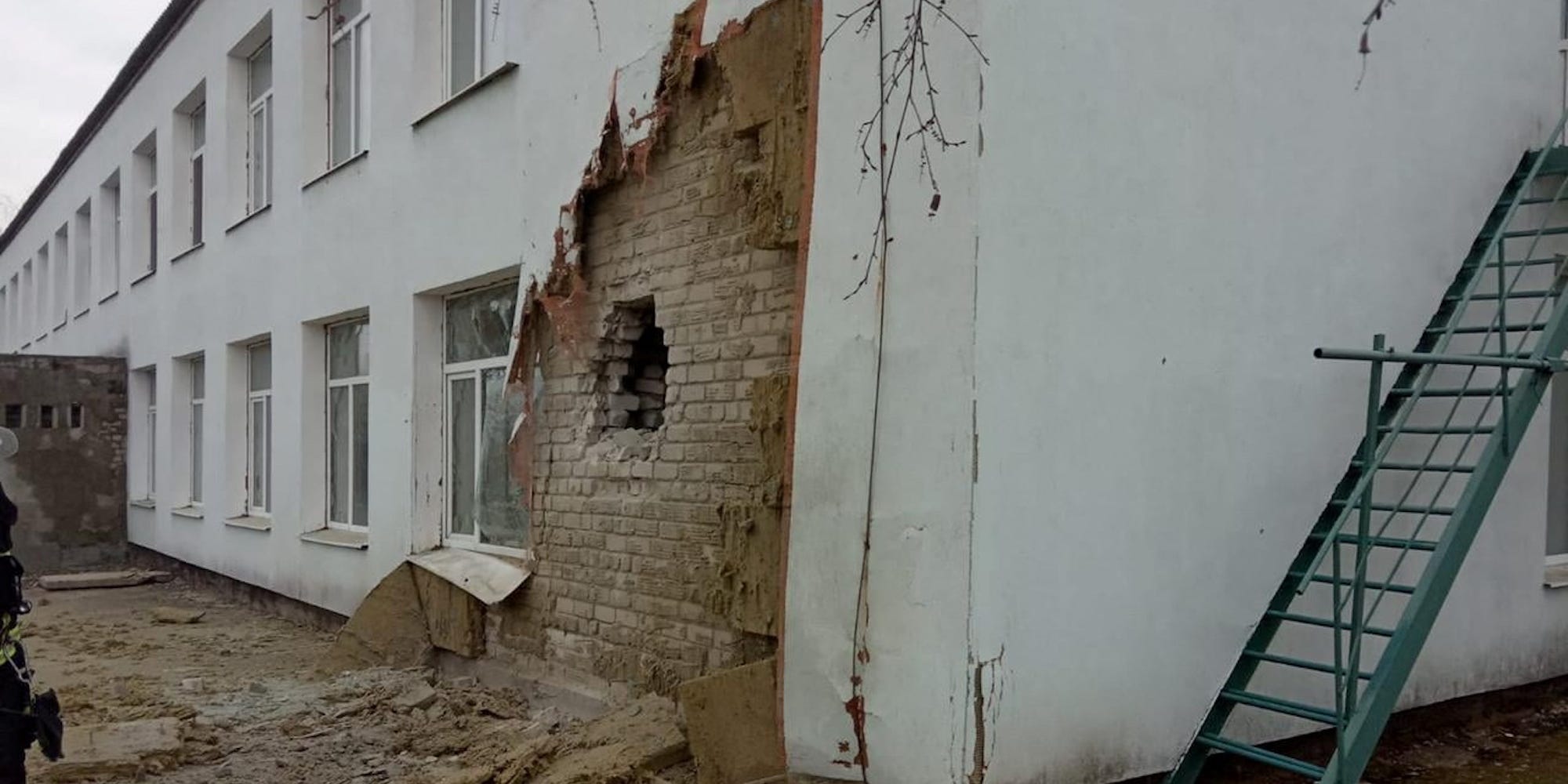 An exterior view shows a kindergarten, which according to Ukraine's military officials was damaged by shelling, in Stanytsia Luhanska in the Luhansk region, Ukraine, in this handout picture released February 17, 2022.