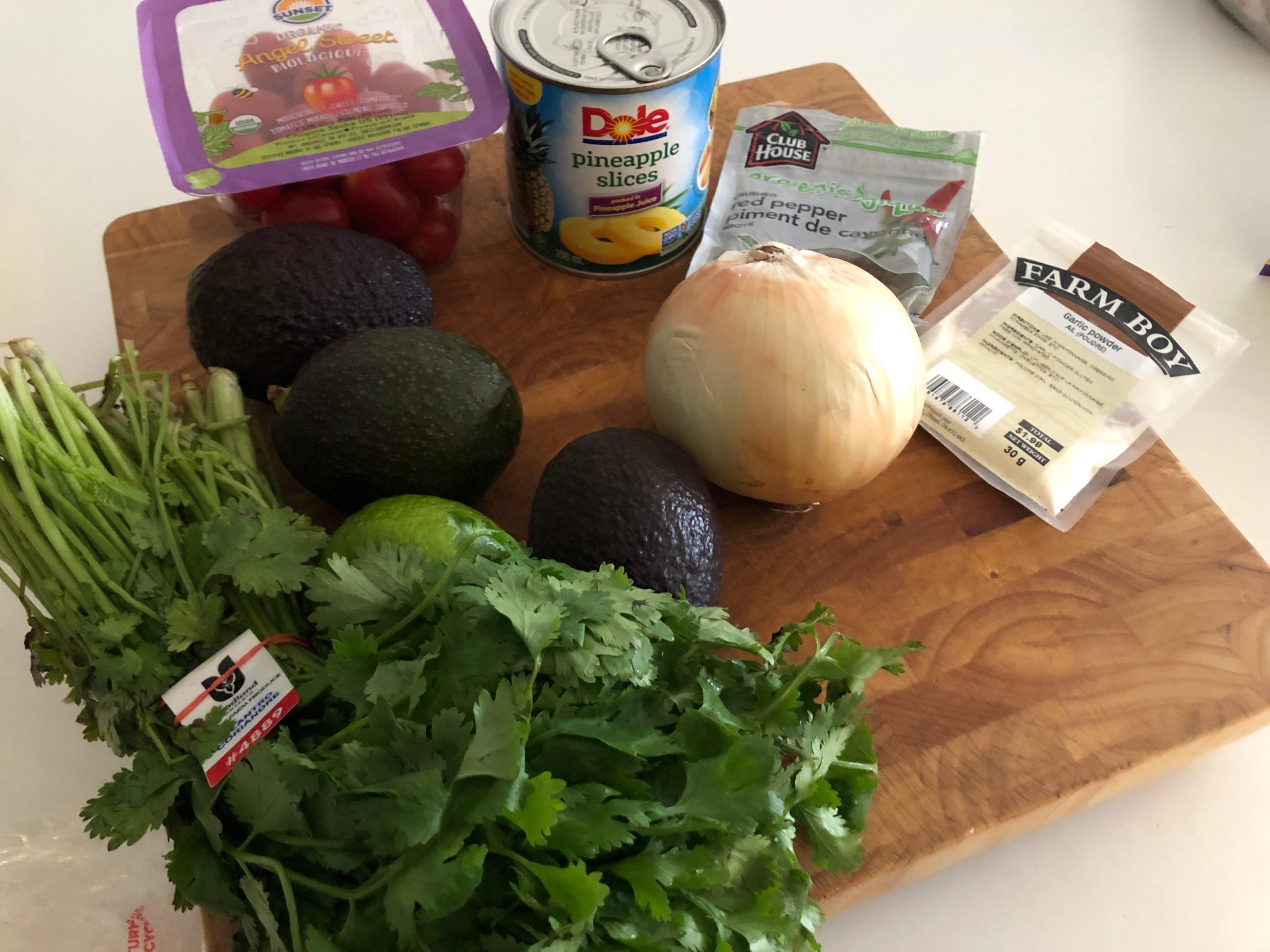 The ingredients for Trisha Yearwood's burritos laid out on wooden cutting board