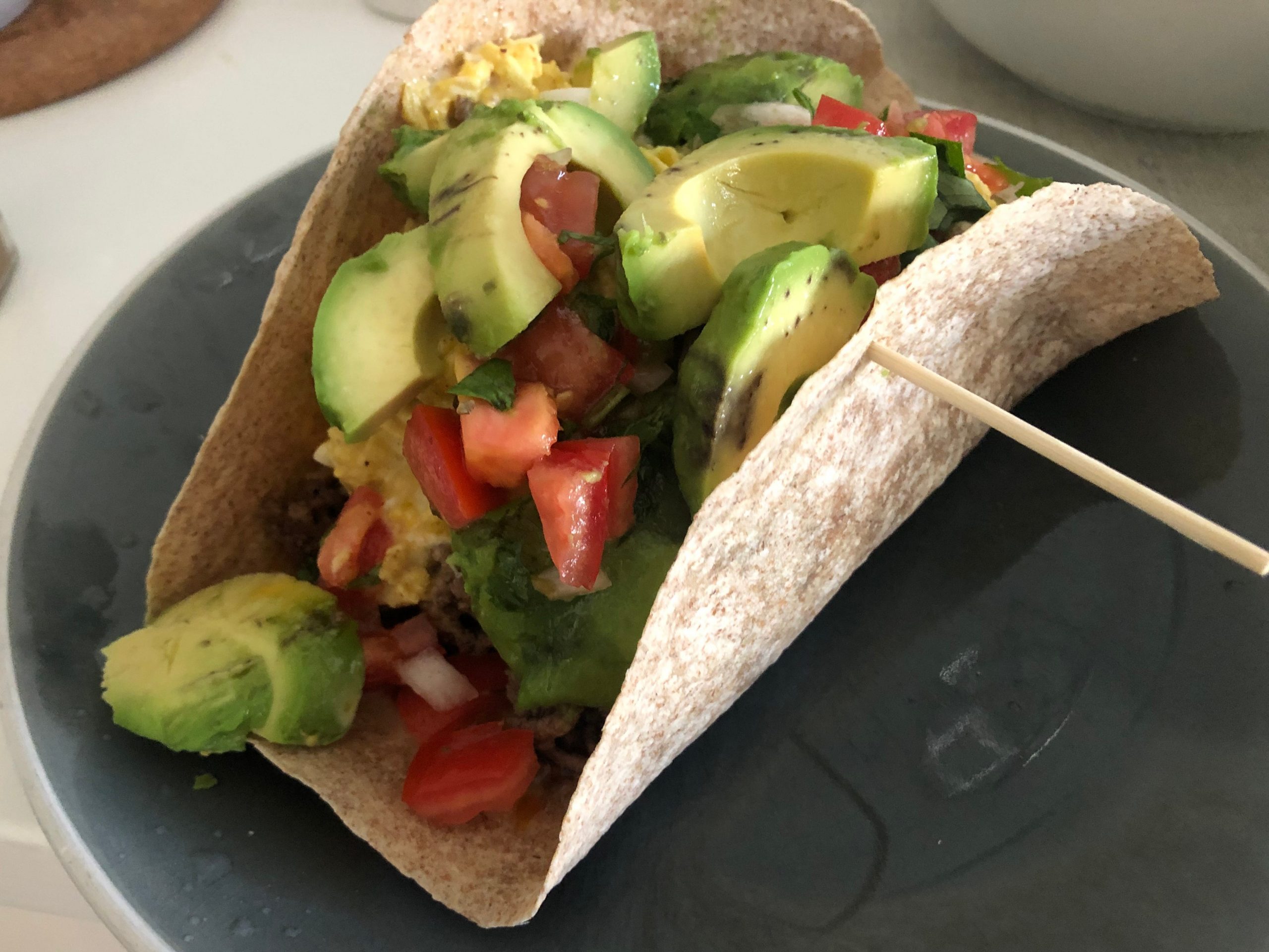 Gordon Ramsay breakfast burrito held together with wooden skewer