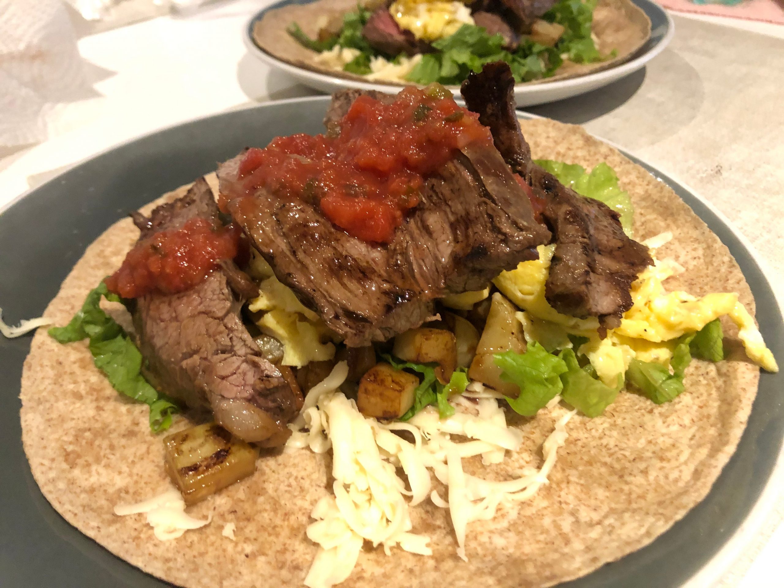 Assembling the burritos on plates