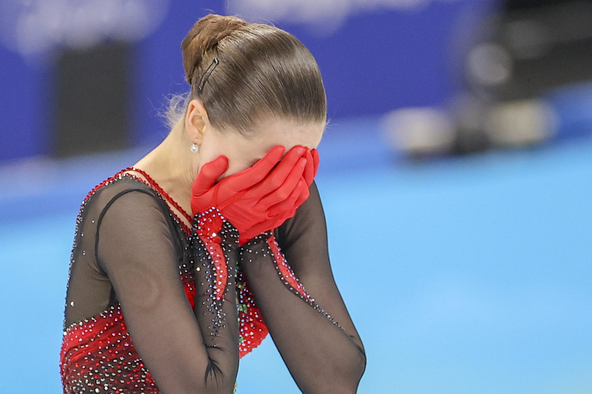Kamila Valieva of ROC reacts to her score after the Women Single Skating Free Skating on day thirteen of the Beijing 2022 Winter Olympic Games at Capital Indoor Stadium