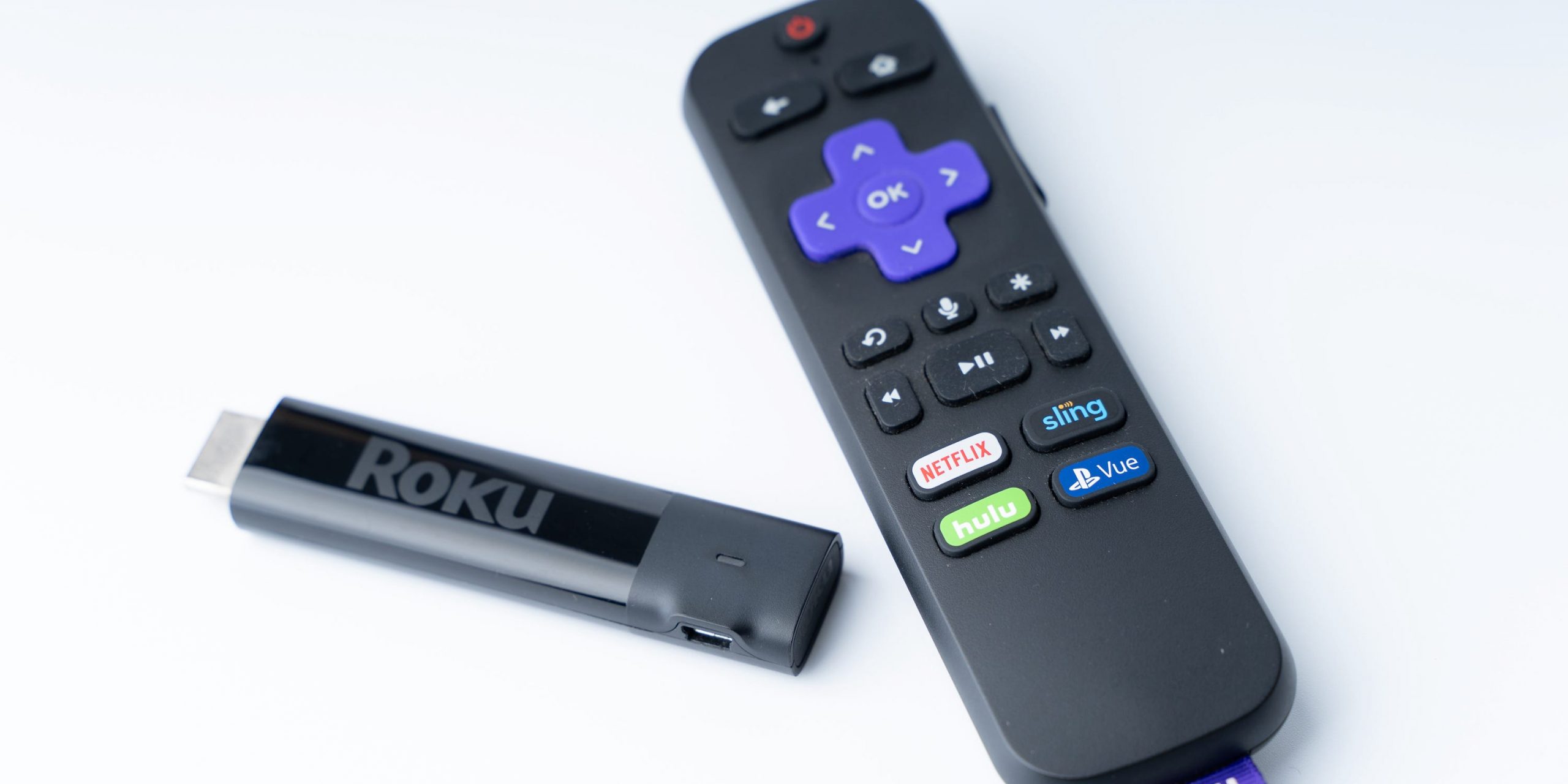 A Roku Streaming Stick and remote.