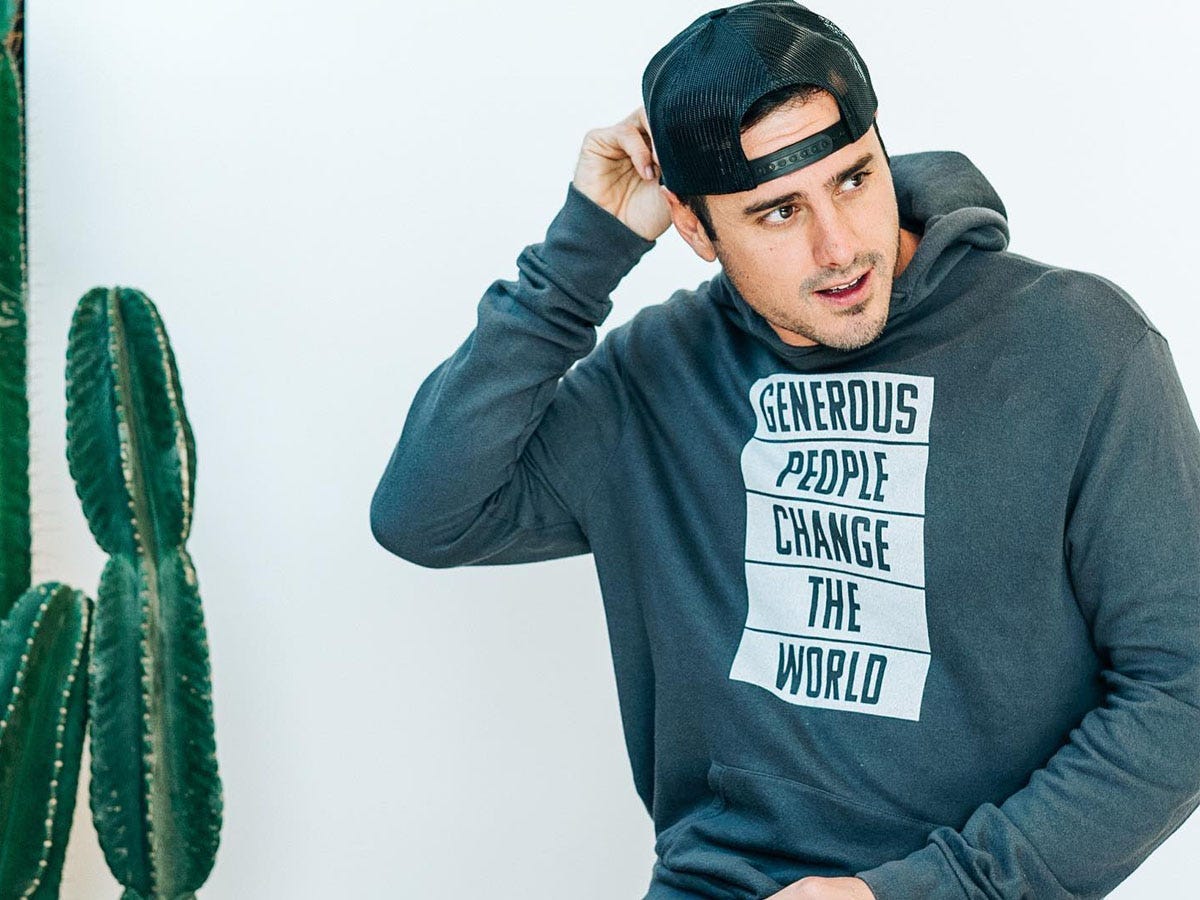 Image of Ben Higgins wearing generous coffee sweatshirt for generous coffee review 2022