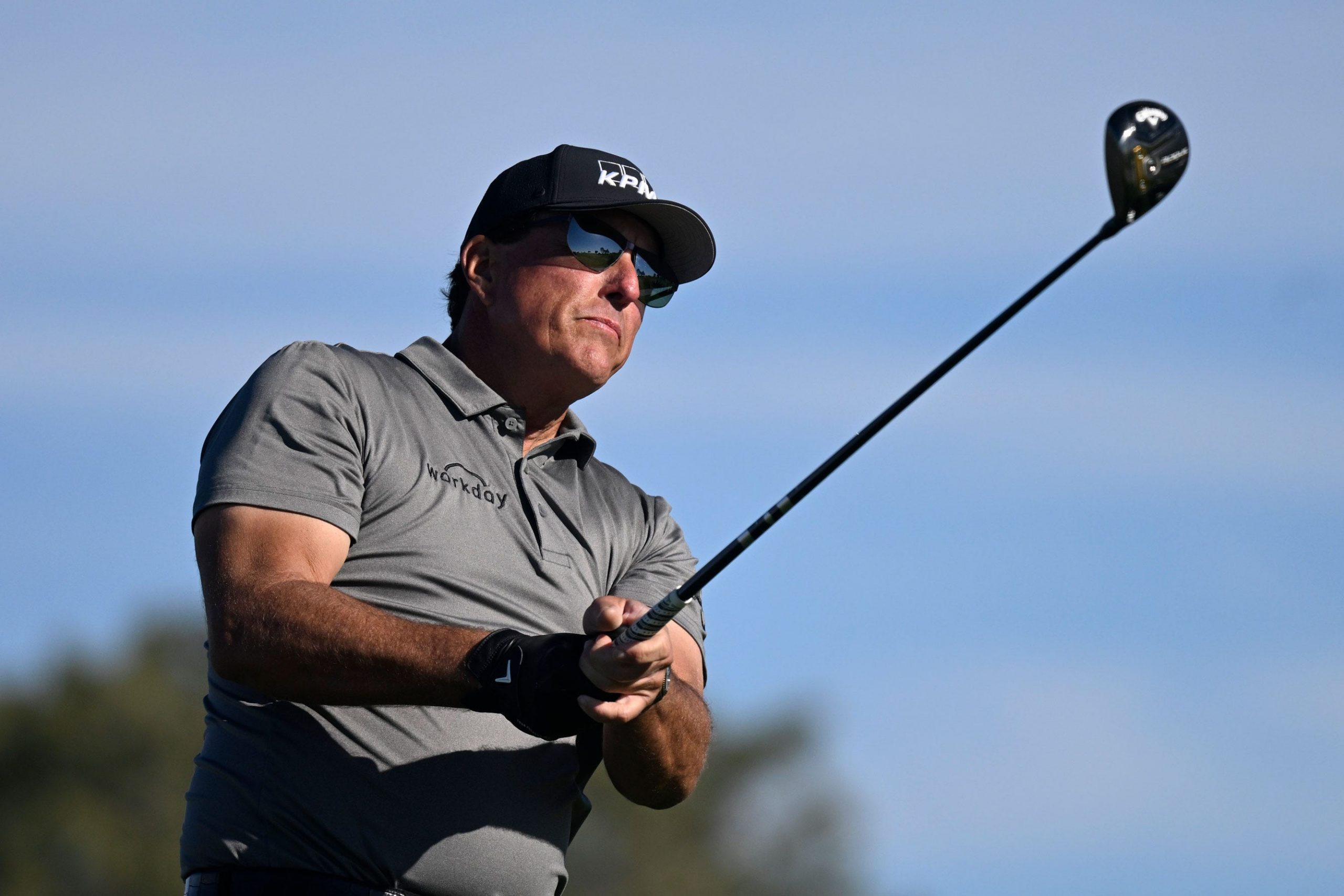 Phil Mickelson plays a shot at the the Farmers Insurance Open.