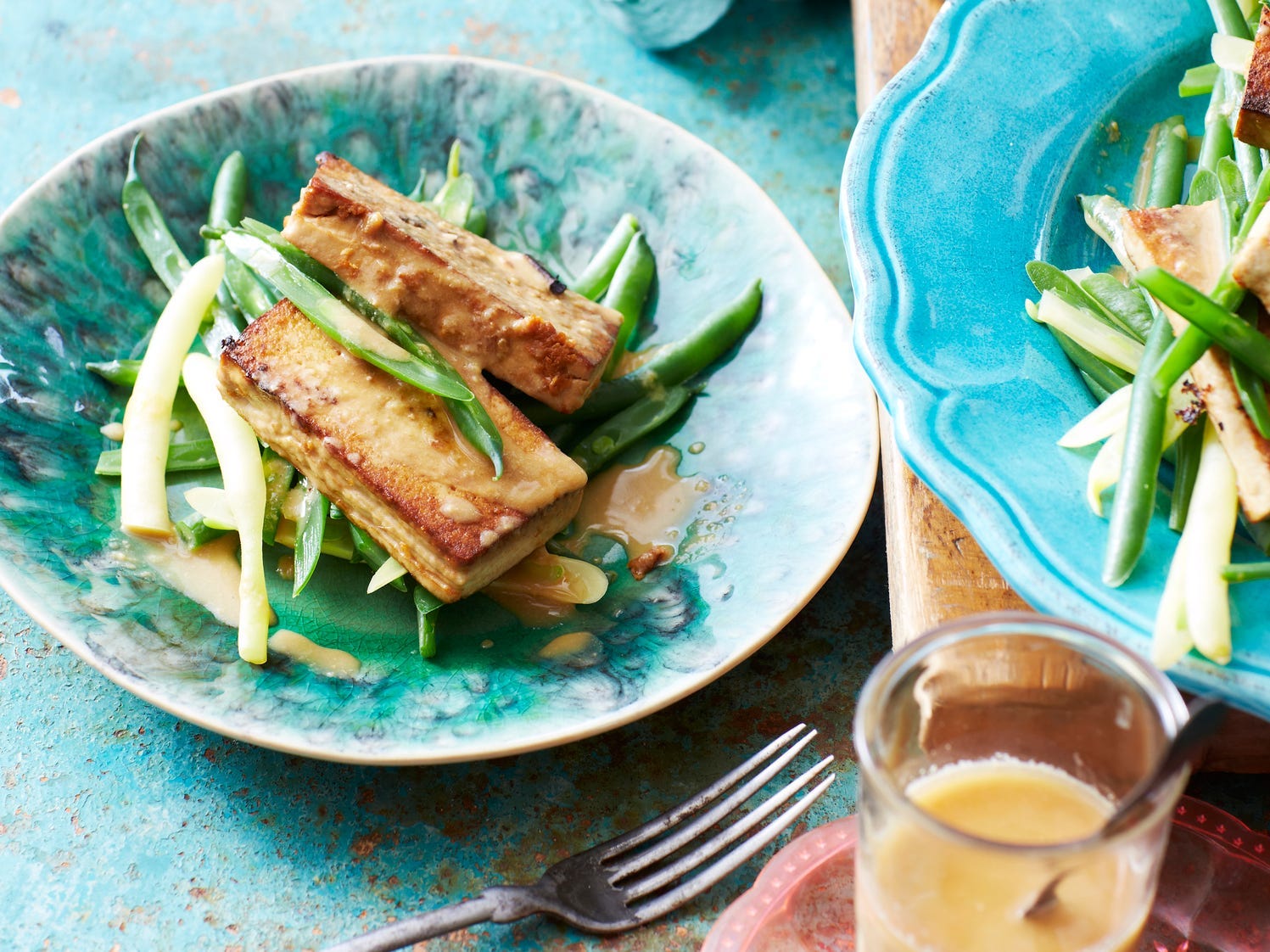 Pan seared tofu in a bowl with veggies