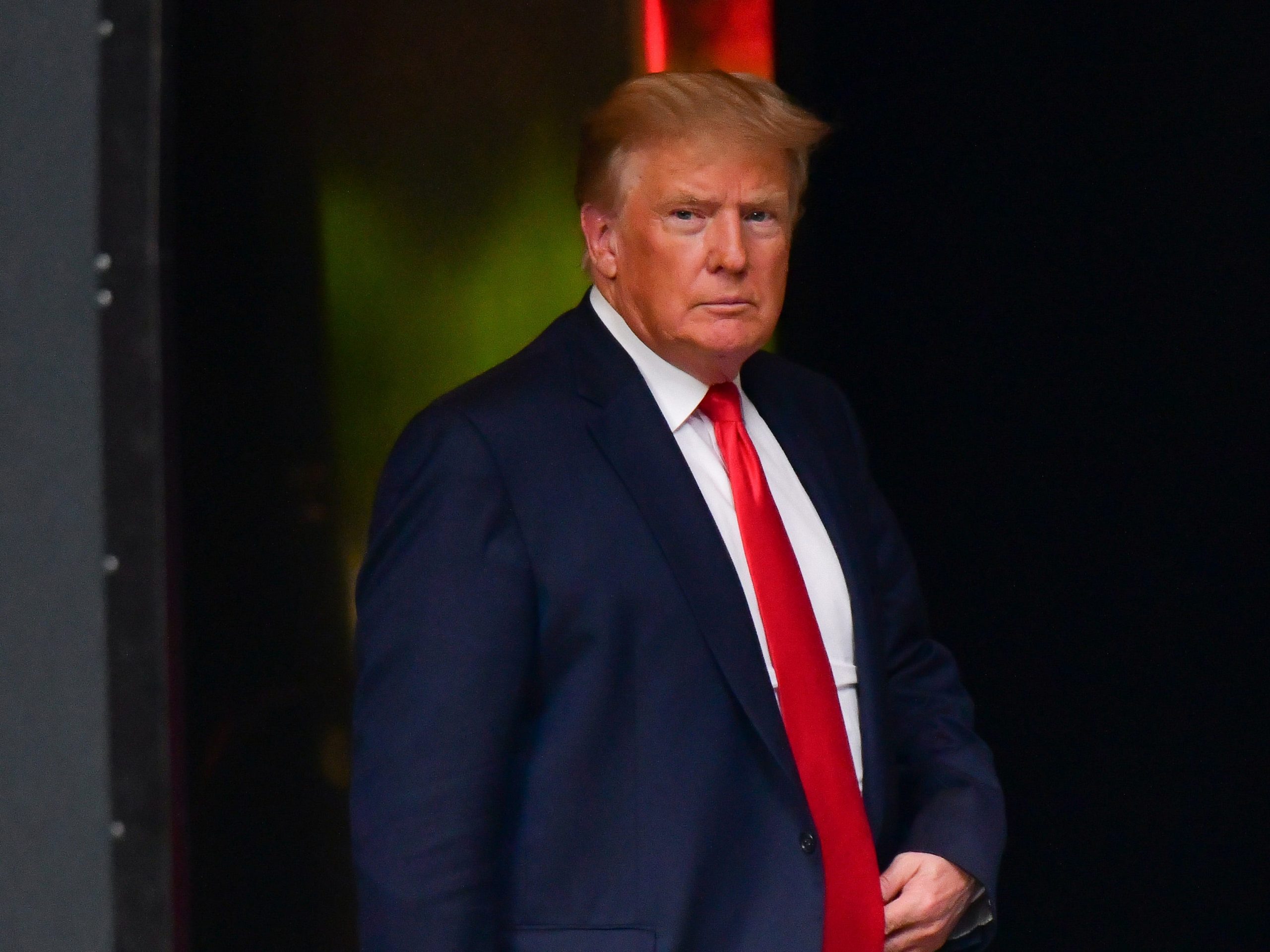 Donald Trump portrait in dark suit and red tie