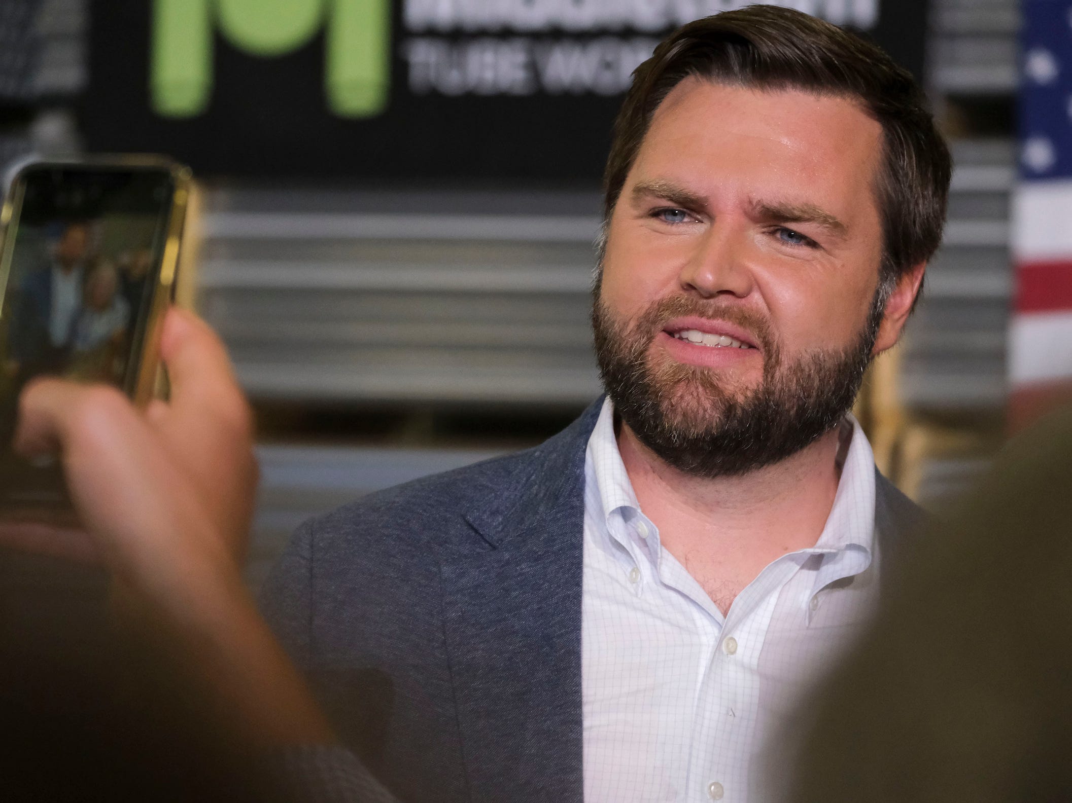 JD Vance takes photos with supporters after a 2021 rally in Middletown, Ohio