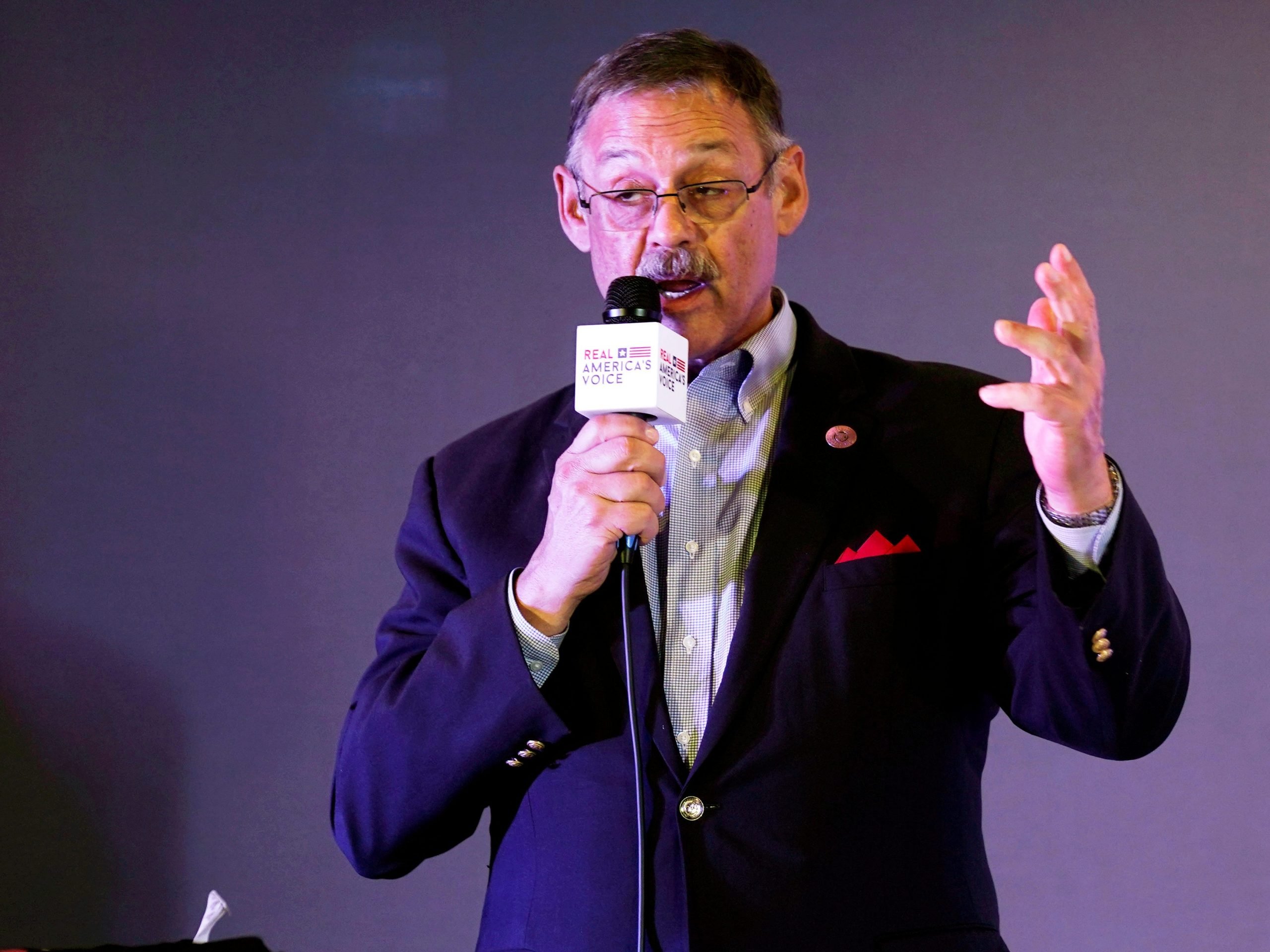 State Rep. Mark Finchem, of Arizona, gestures as he speaks during an election rally in Richmond, Va., on Oct. 13, 2021.