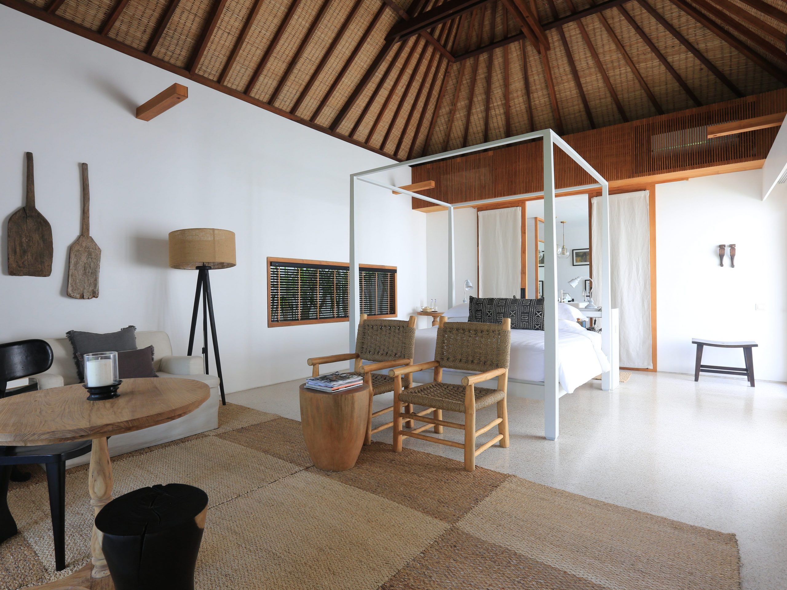 Interior of a bedroom with minimalistic design and wood accents