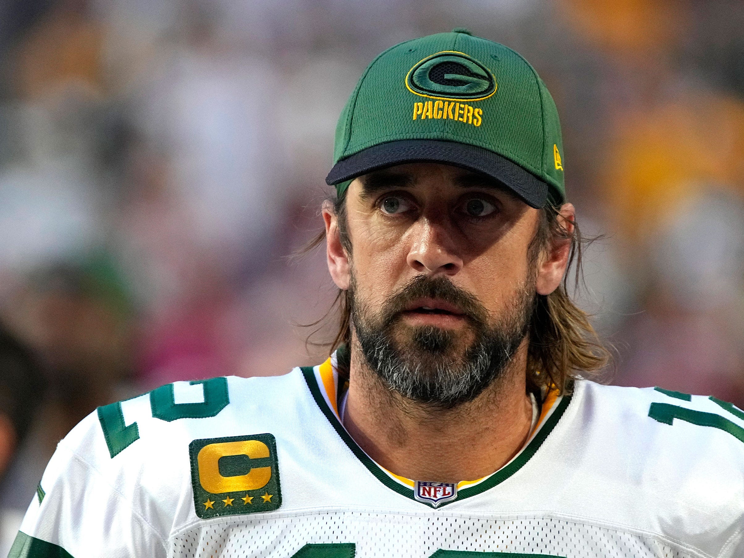 Aaron Rodgers on the field before a game against the Arizona Cardinals.