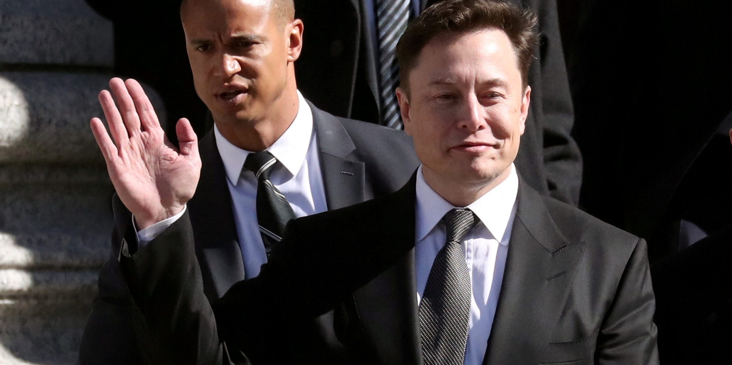 Tesla CEO Elon Musk waving.