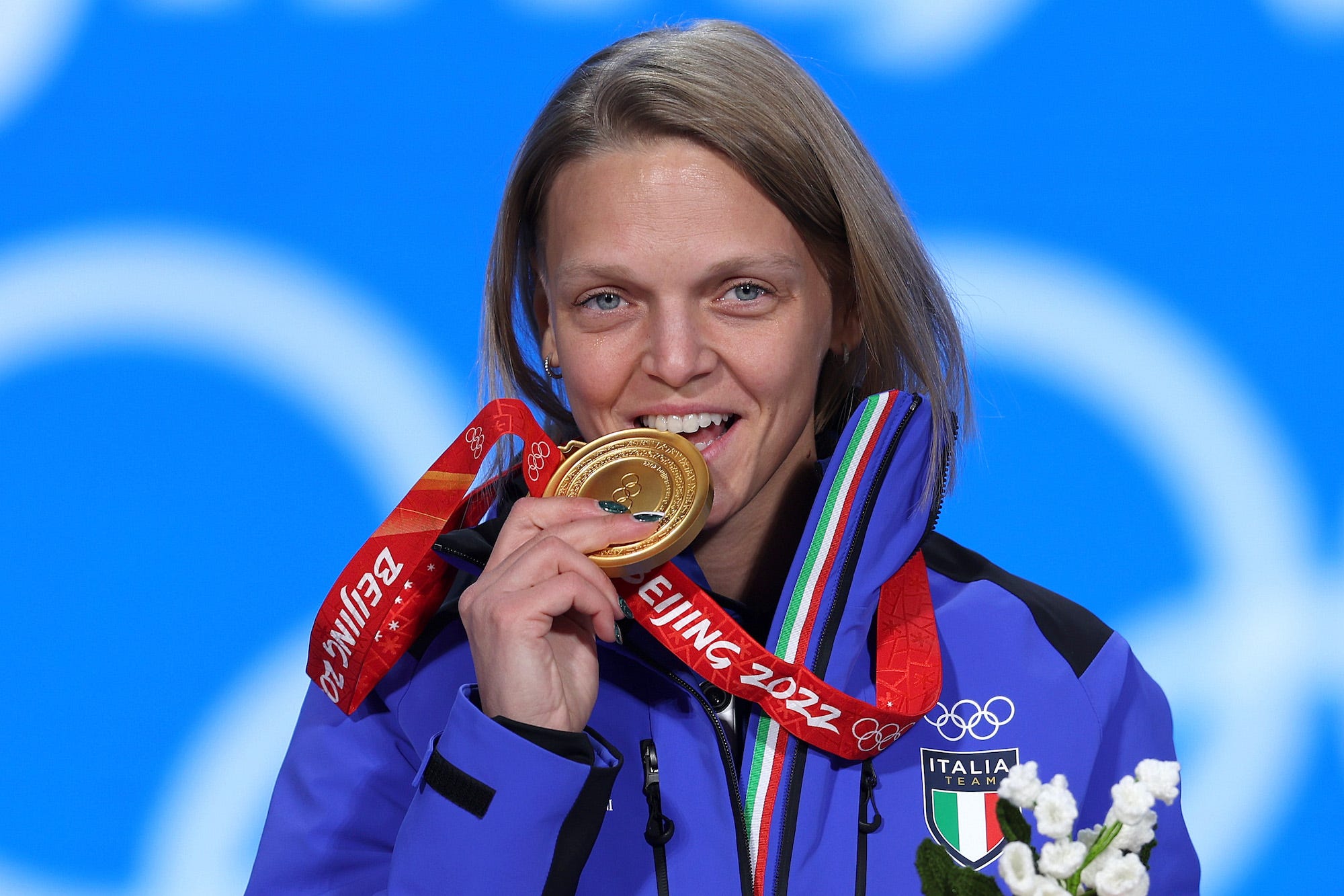 Gold medallist Arianna Fontana of Team Italy poses with their medal during the Women's 500m Speed Skating medal ceremony on Day 4 of the Beijing 2022 Winter Olympic Games at Beijing Medal Plaza