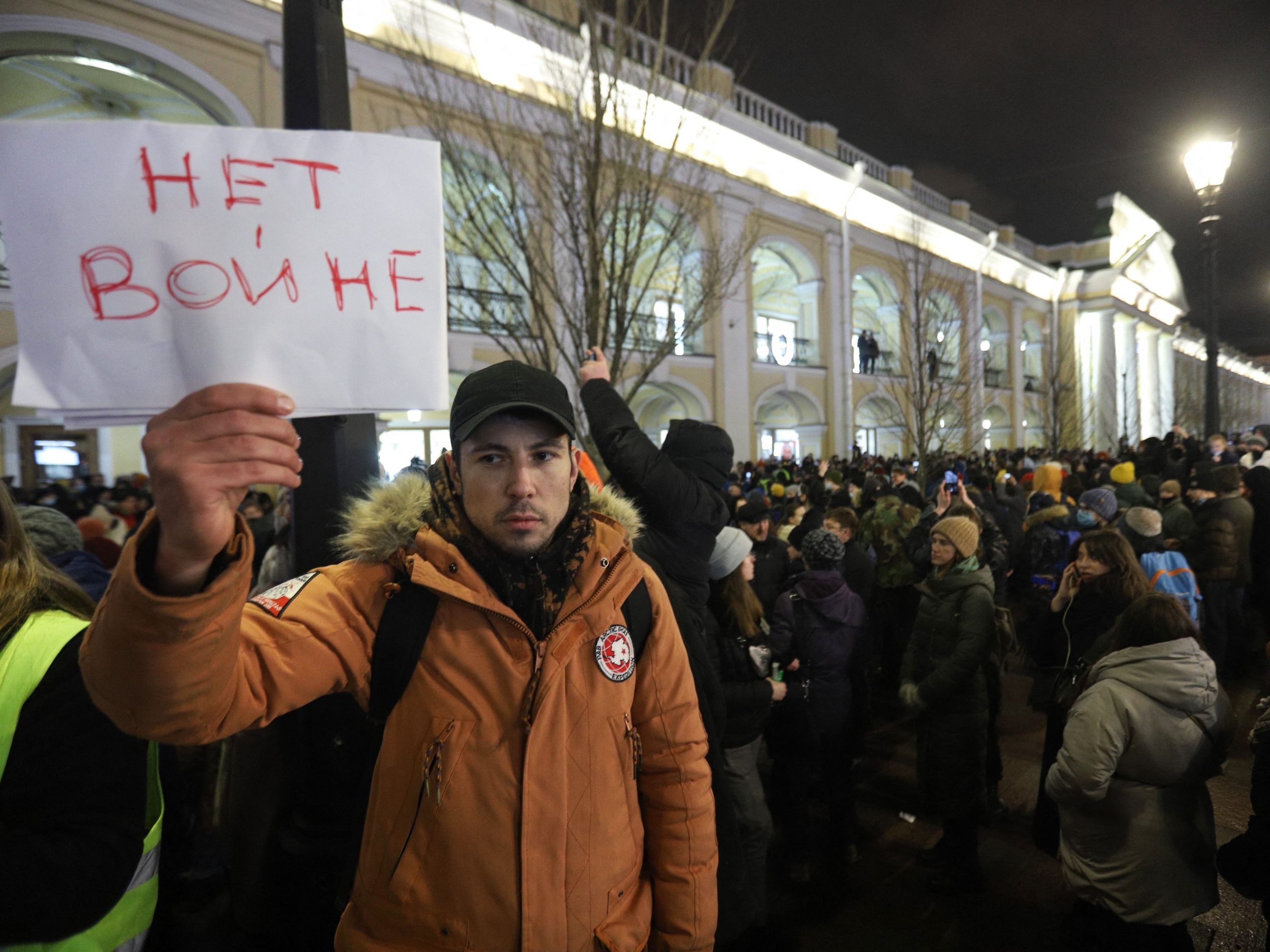 A demonstrator holding a placard reading "No to war" protests against Russia's invasion of Ukraine in central Saint Petersburg on February 24, 2022.