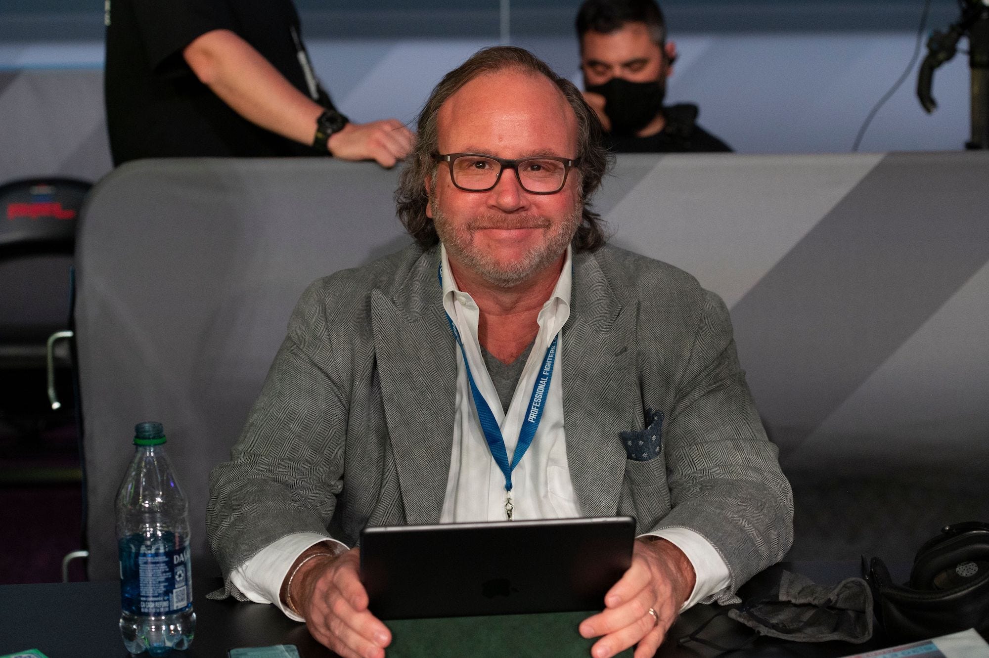 Donn Davis in his seat at a PFL MMA event.