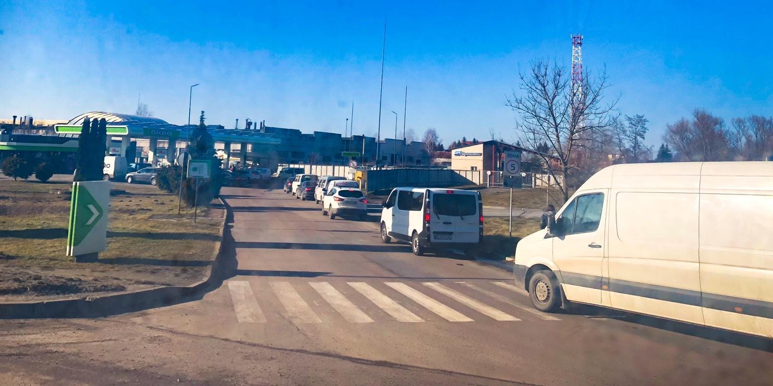 Cars outside a petrol station near the Ukraine-Poland border