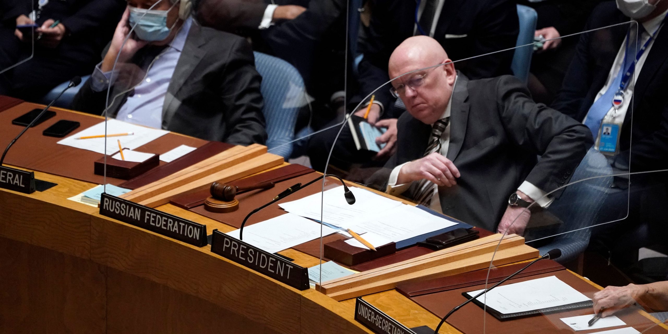 Permanent Representative of the Russian Federation to the UN, Vasily Nebenzya (R) and UN Secretary-General Antonio Guterres (L) attend an emergency meeting of the UN Security Council on Ukraine in New York on February 23, 2022.