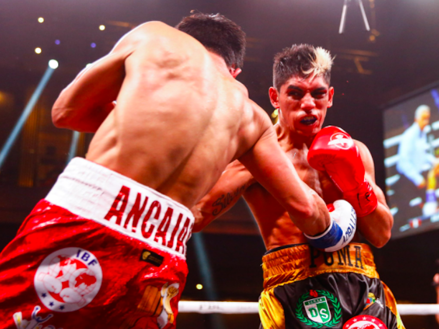 Jerwin Ancajas and Fernando Martinez went to war Saturday.