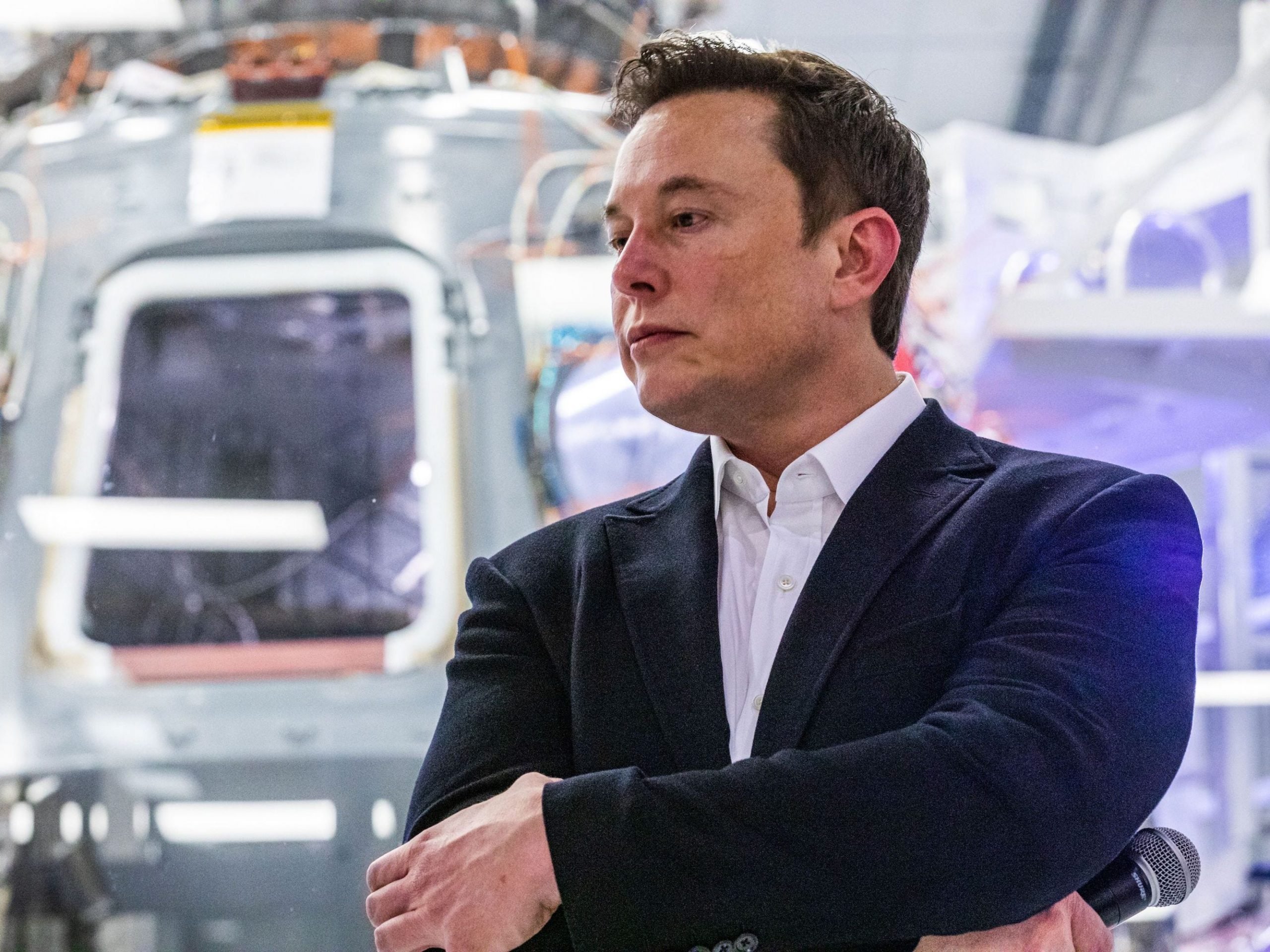 SpaceX founder Elon Musk addresses members of the media during a press conference announcing new developments of the Crew Dragon reusable spacecraft, at SpaceX headquarters in Hawthorne, California on October 10, 2019.