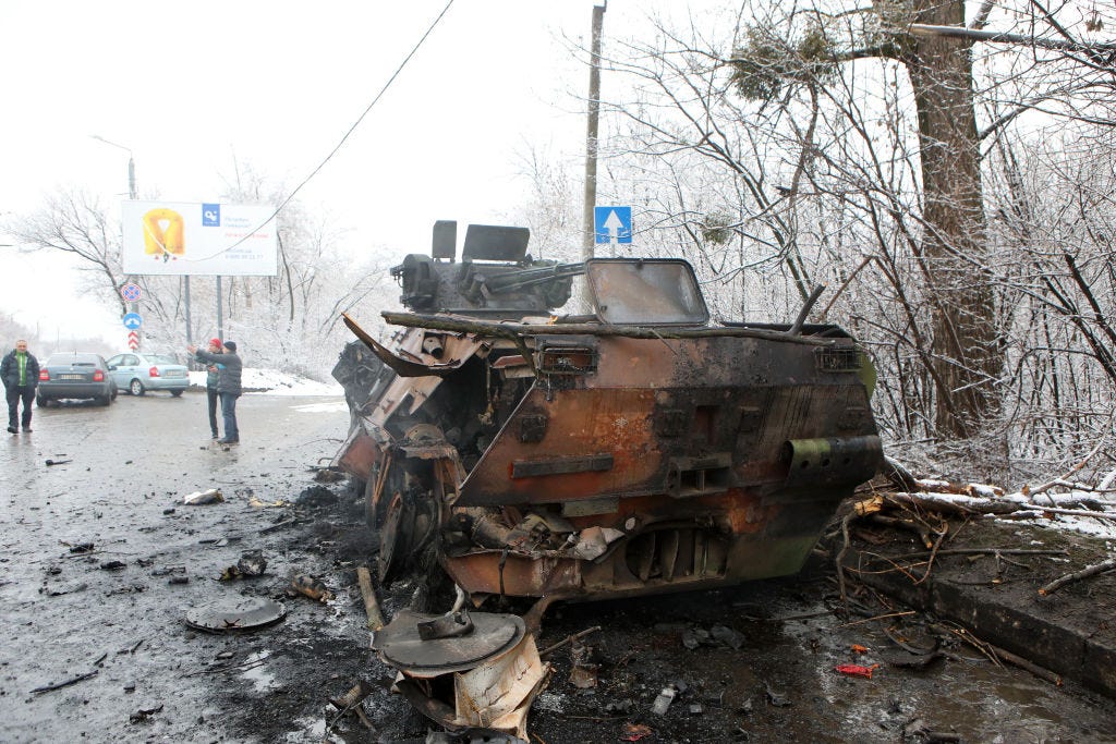A damaged military vehicle is pictured on the outskirt of Kharkiv, northeastern Ukraine