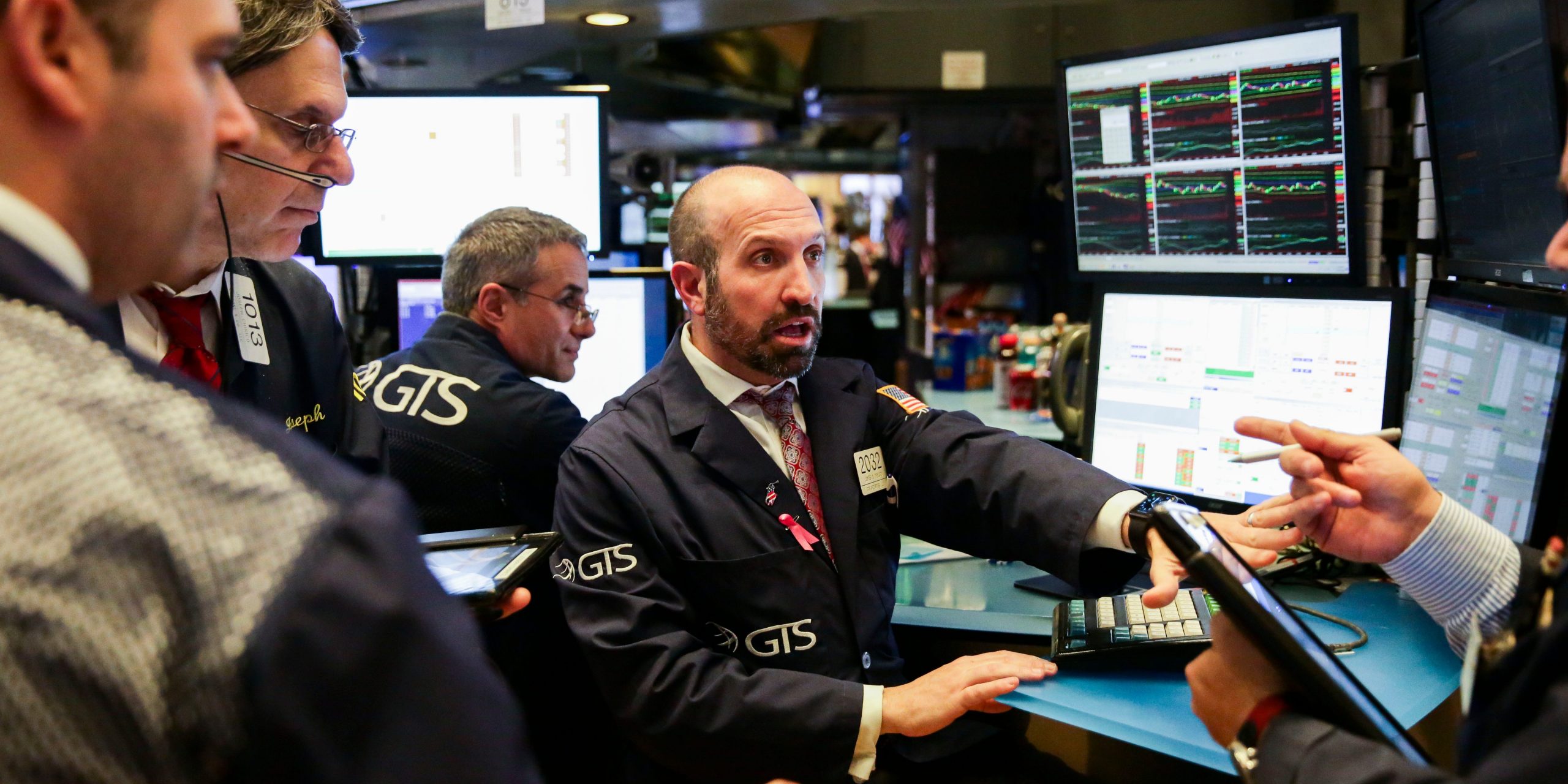 Traders work at the New York Stock Exchange in New York, the United States, Nov. 20, 2018.