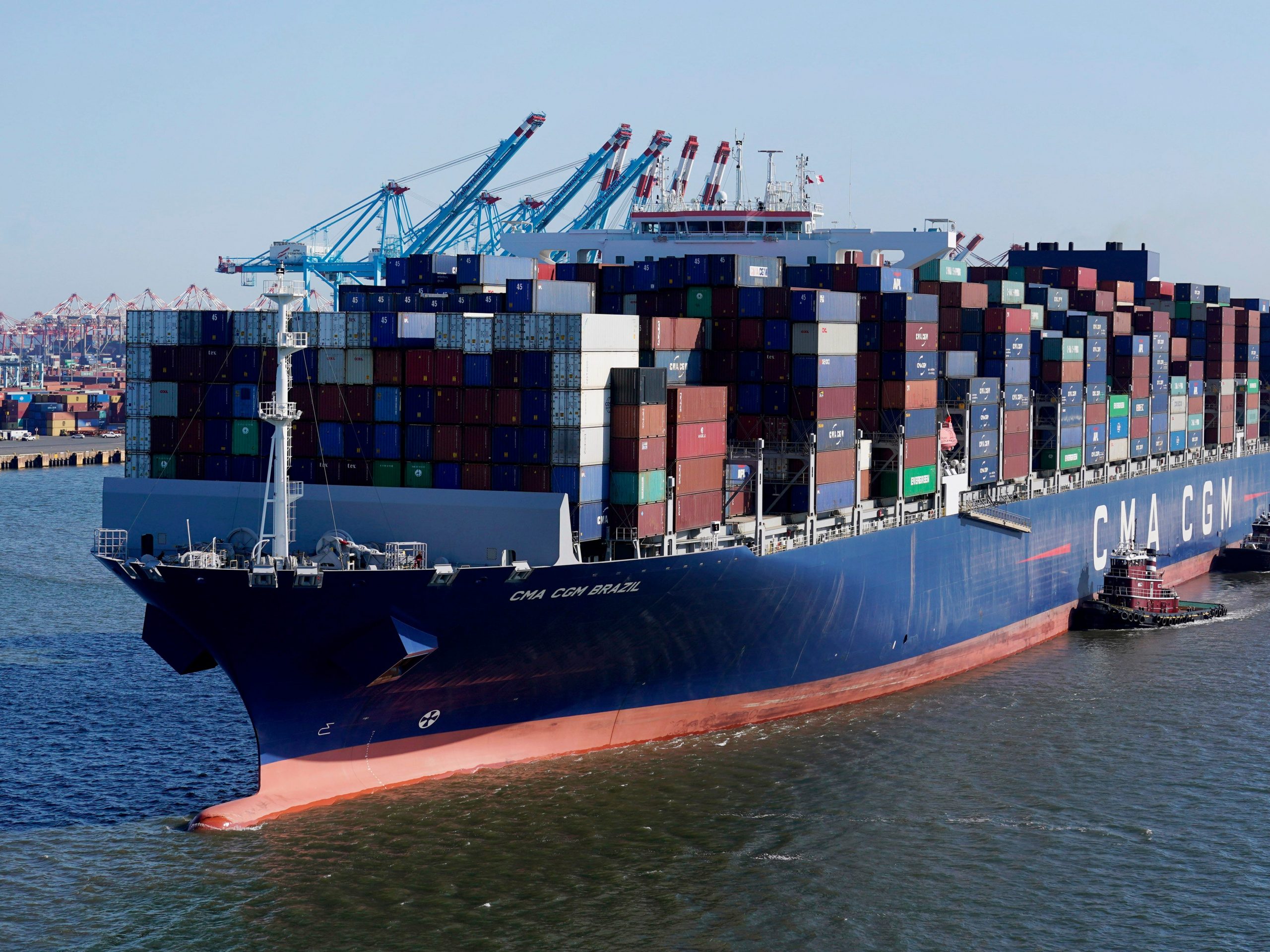 A large cargo ship filled with shipping containers