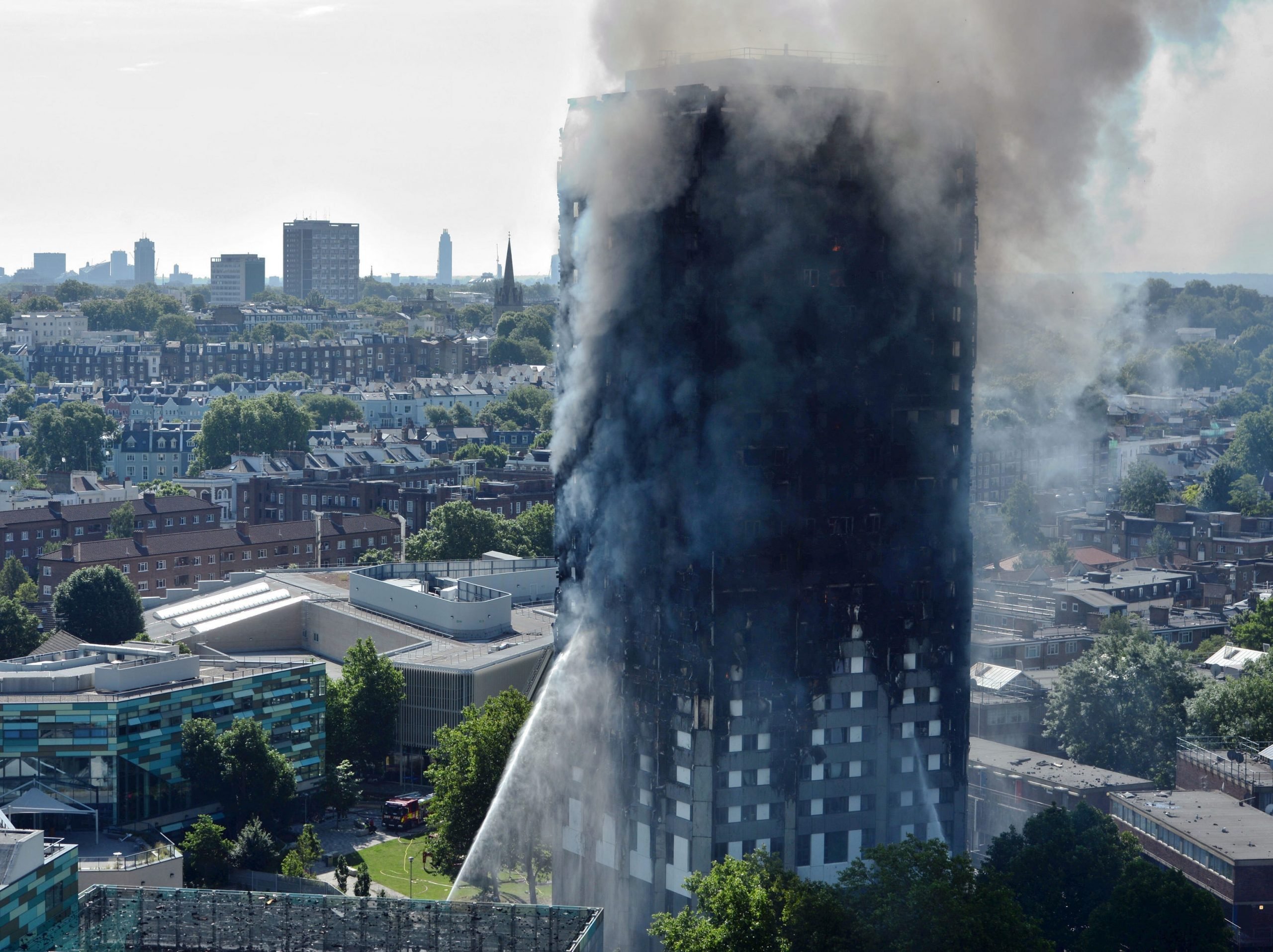 Smoke billows from a fire that engulfed the 24-storey Grenfell Tower in west London.