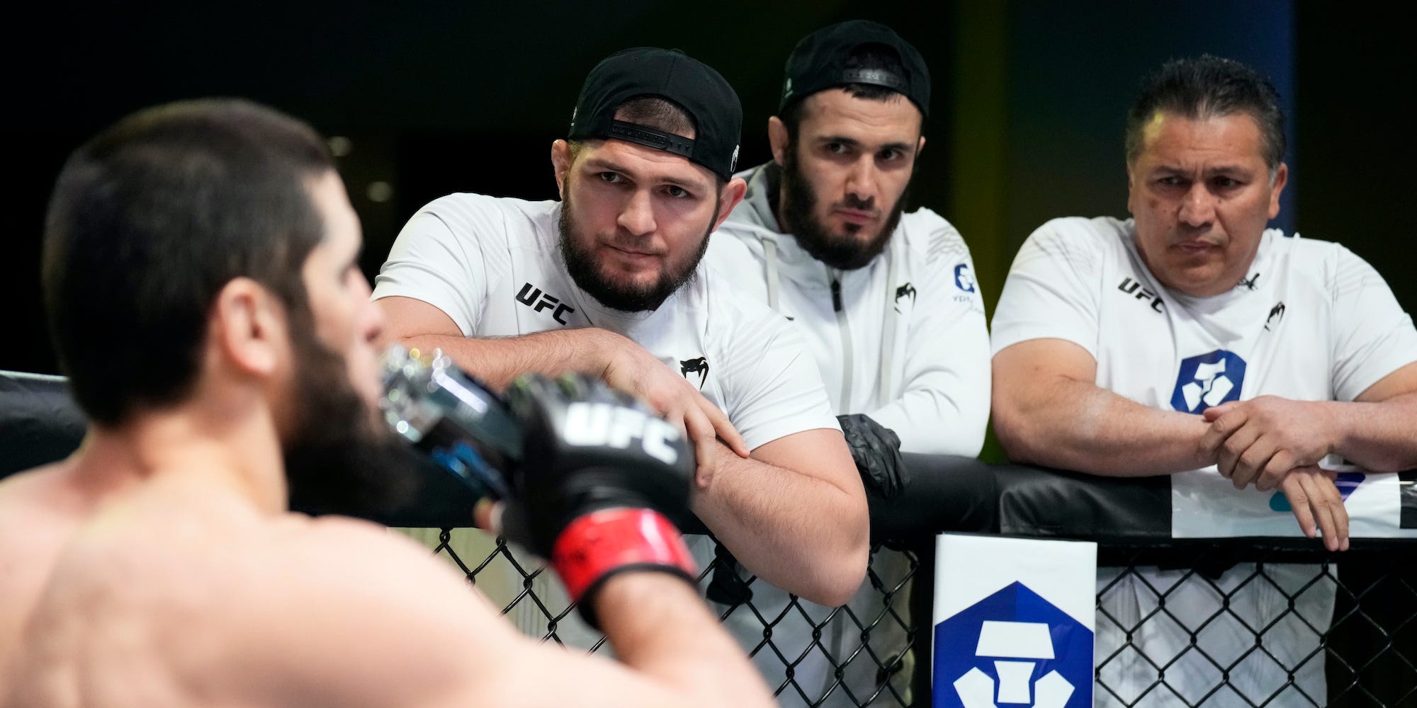 Khabib Nurmagomedov is seen in the corner of Islam Makhachev.