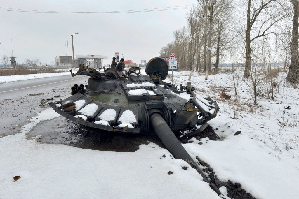A fragment of a destroyed Russian tank is seen on the roadside on the outskirts of Kharkiv on February 26, 2022.