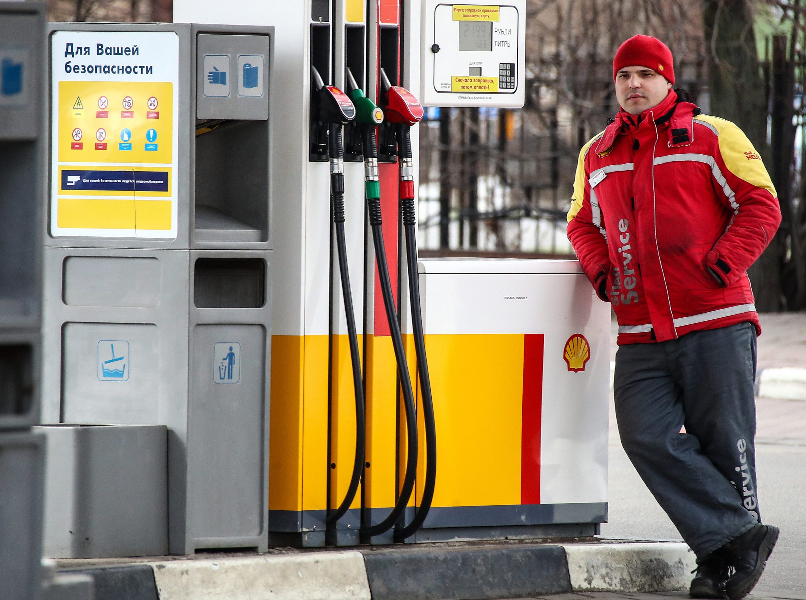 A worker at a Shell gas station in Leningradskoye Highway, Moscow, Russia.