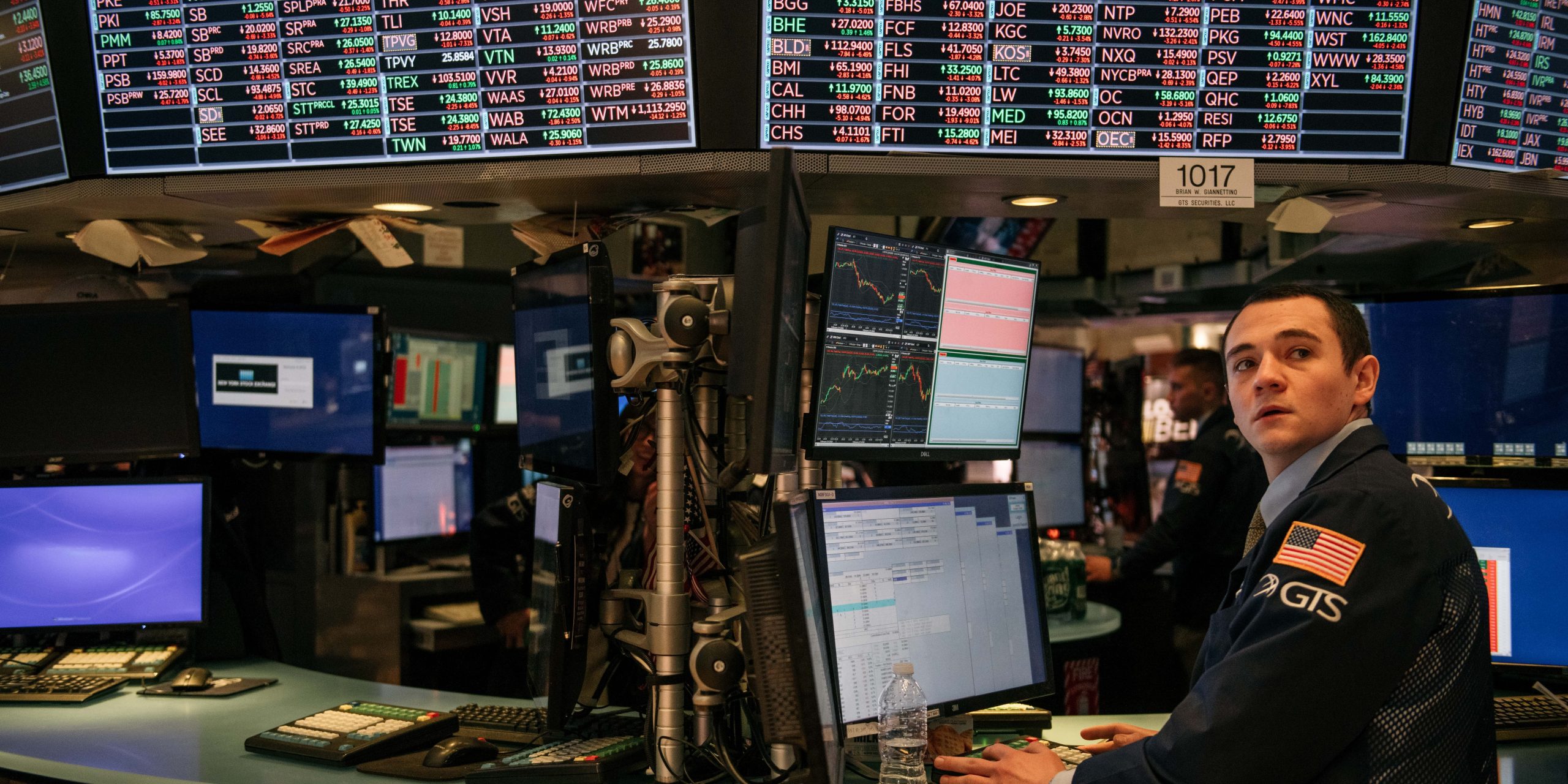 Traders work through the closing minutes of trading Tuesday on the New York Stock Exchange floor on February 25, 2020 in New York City.