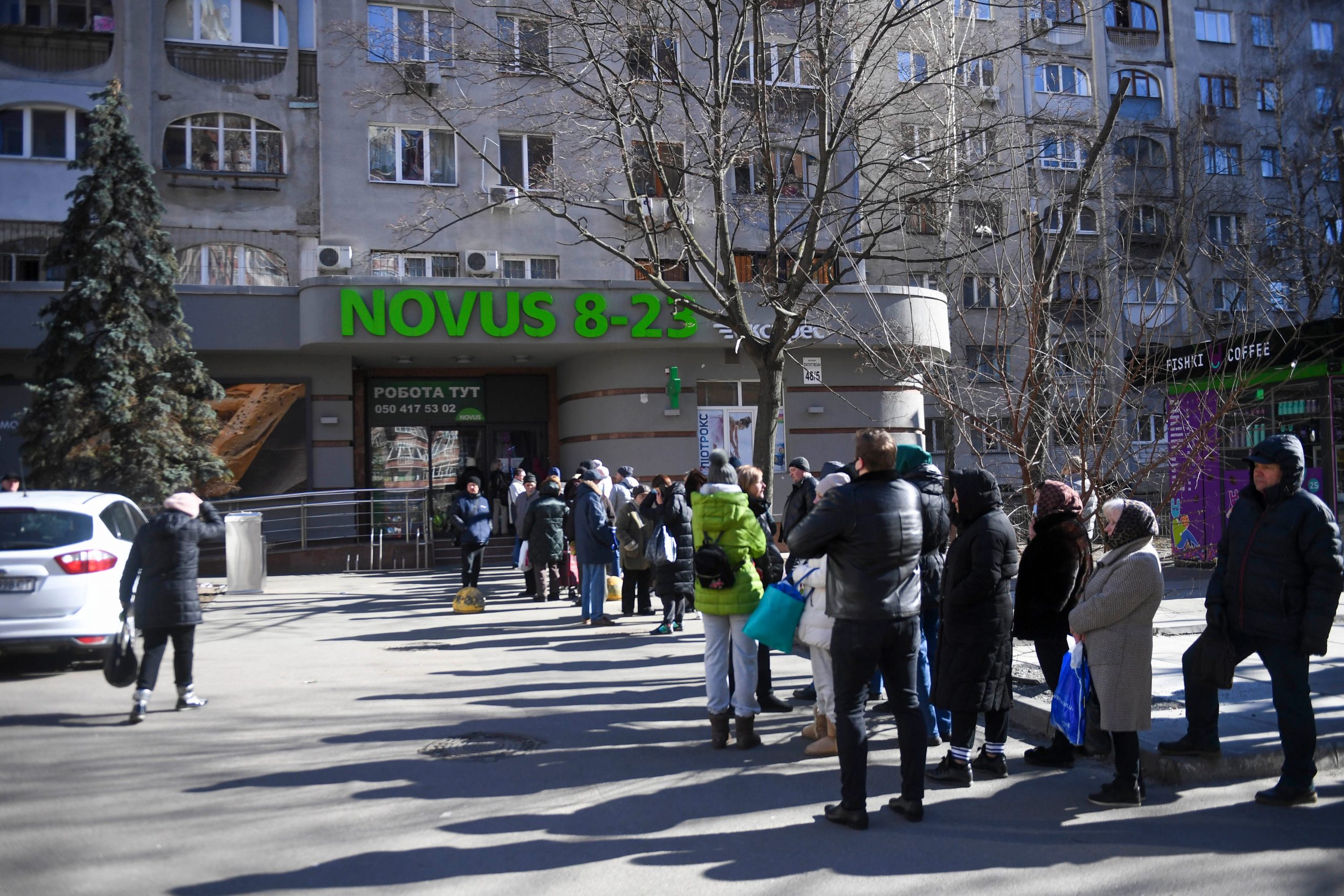 People wait in line at the market on March 1, 2022 in Kyiv, Ukraine.