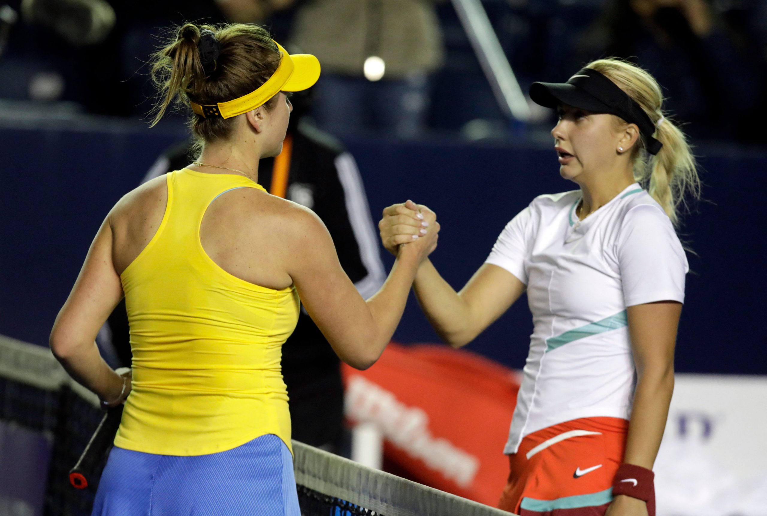 Anasatsia Potapova shakes hands with Ukraine's Elina Svitolina after their first round match