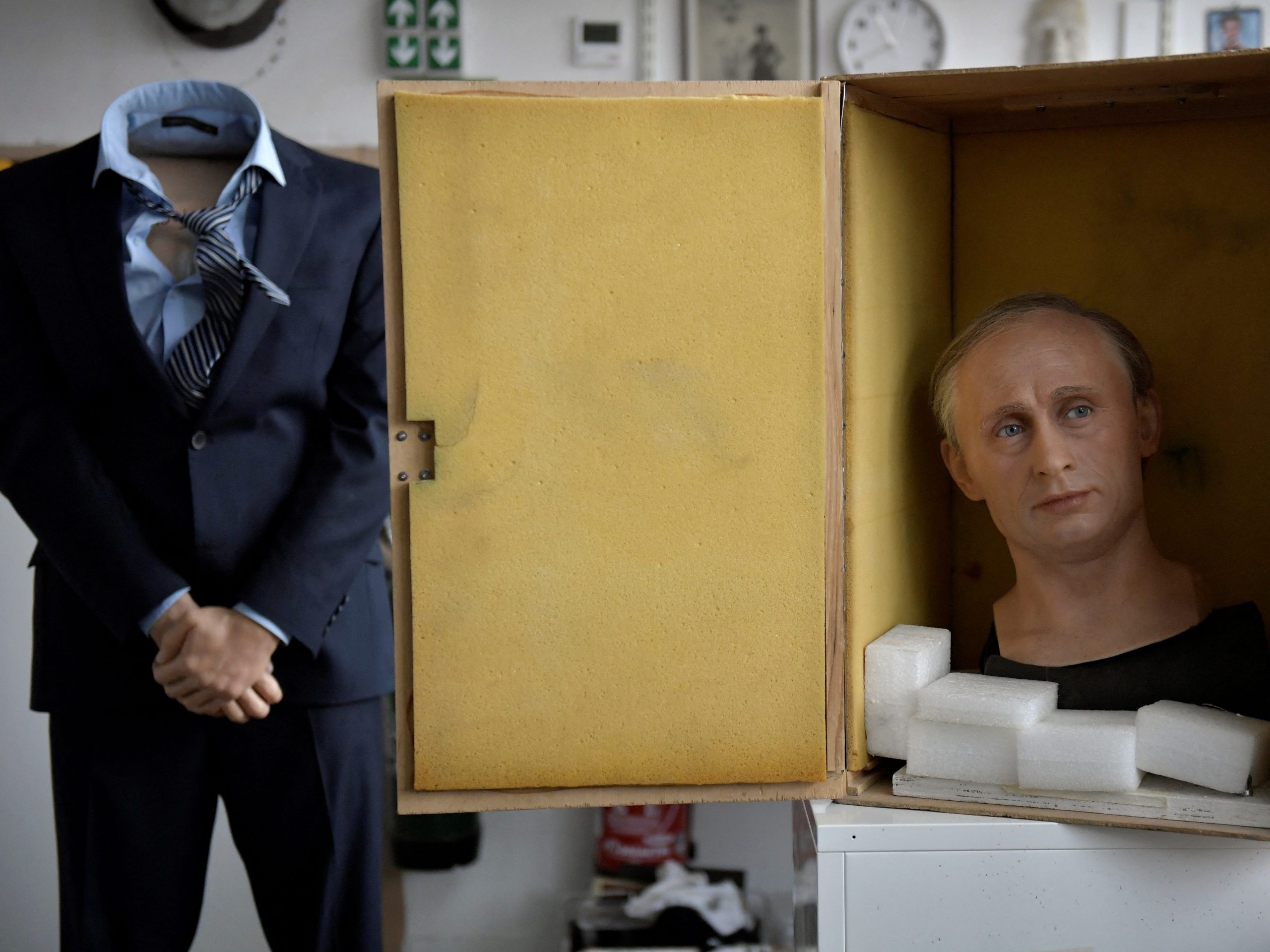 e wax statue of Russian President Vladimir Putin is being packed is a box before it is stored in the reseve, as a reaction to Russia's invasion of Ukraine on March 1, 2022 at the Grevin museum in Paris.