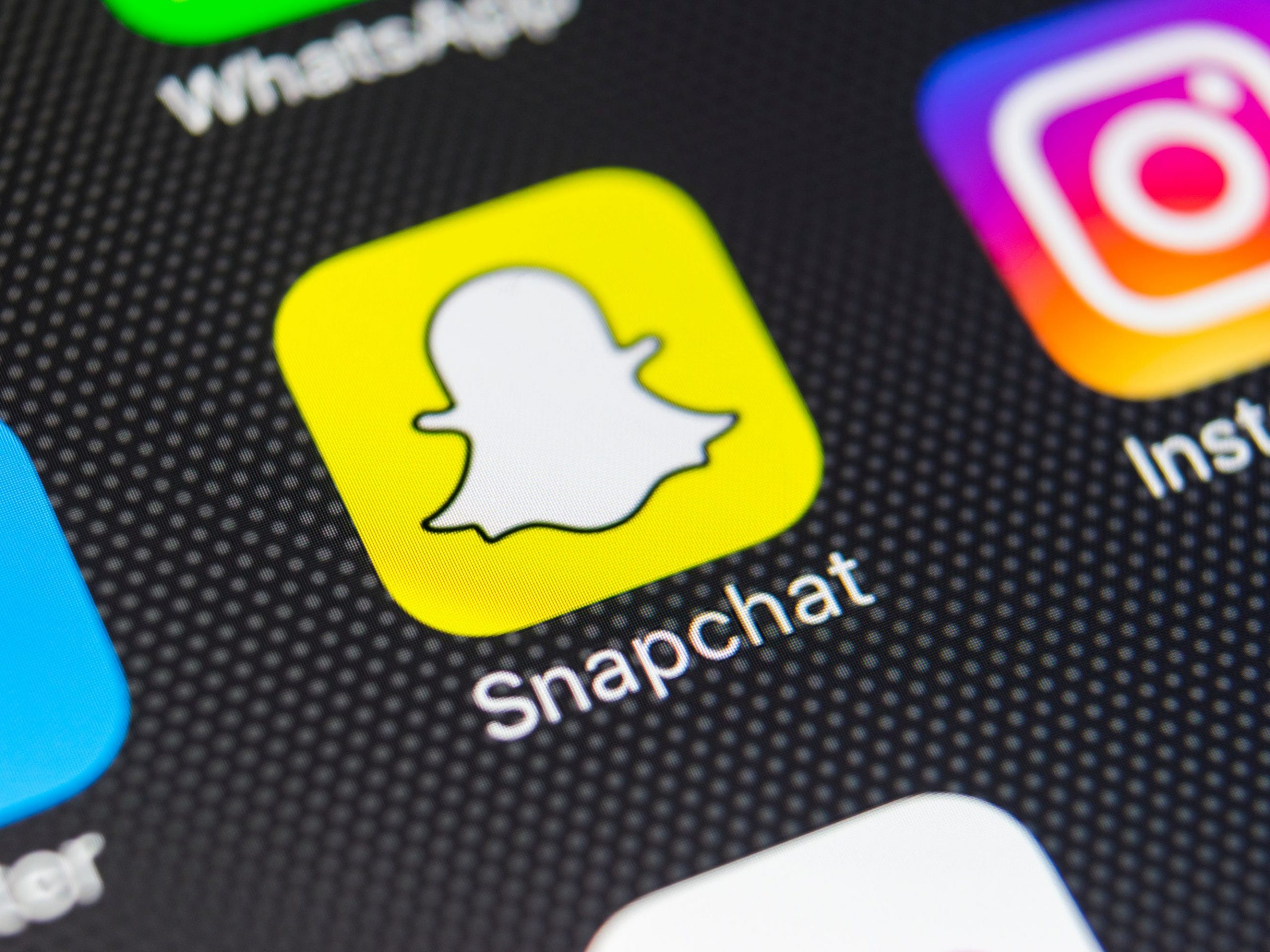 The Snapchat app icon on an iPhone.